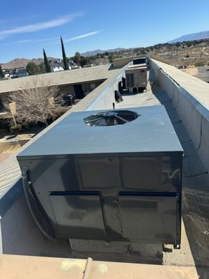 Apartment Building Roof Package Installation