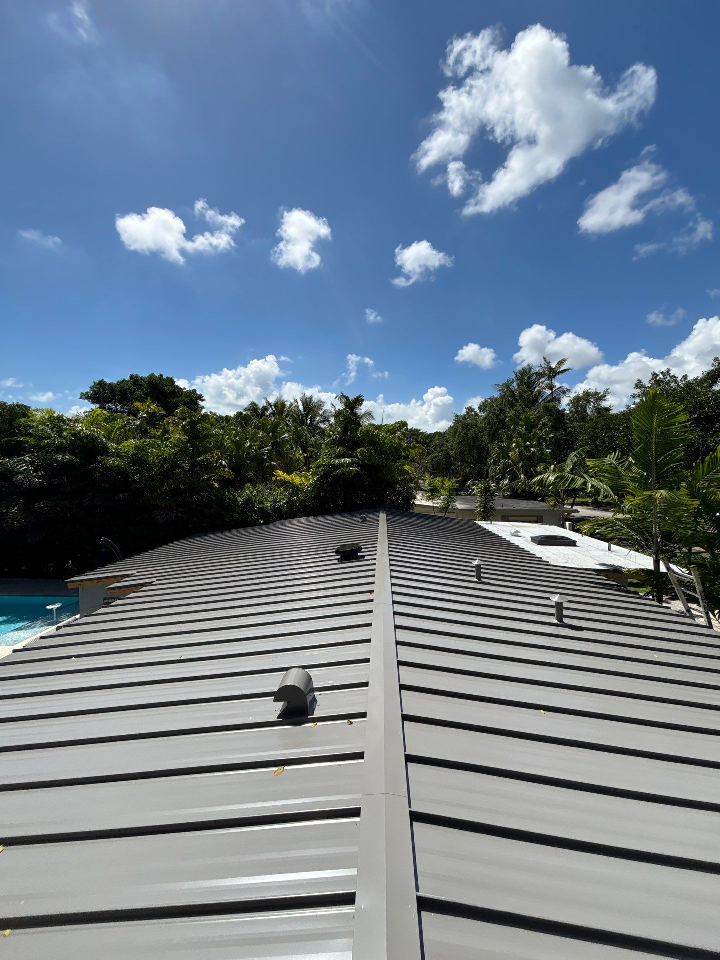 Metal Roof Replacement by Art's Roofing & Construction