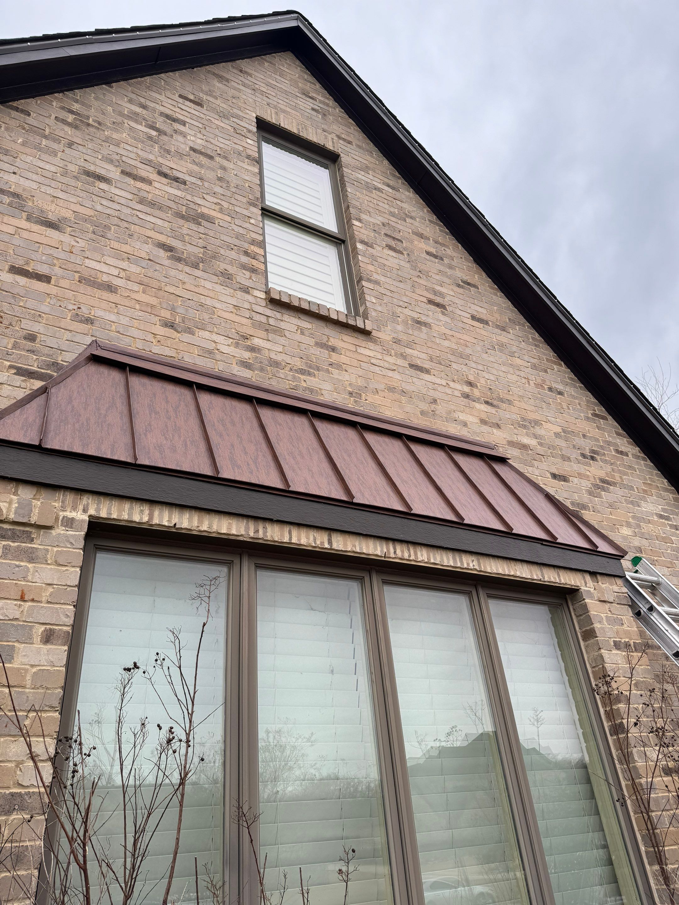 Standing Seam Metal Accent by First Out Roofing 