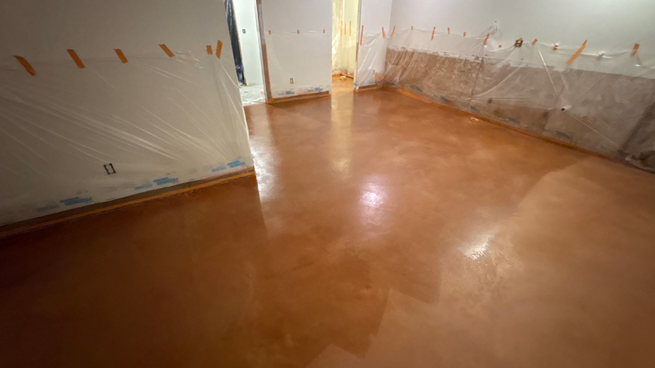 Basement Floor Remodel with Haven Reno KC by Big Red Decorative Concrete, LLC