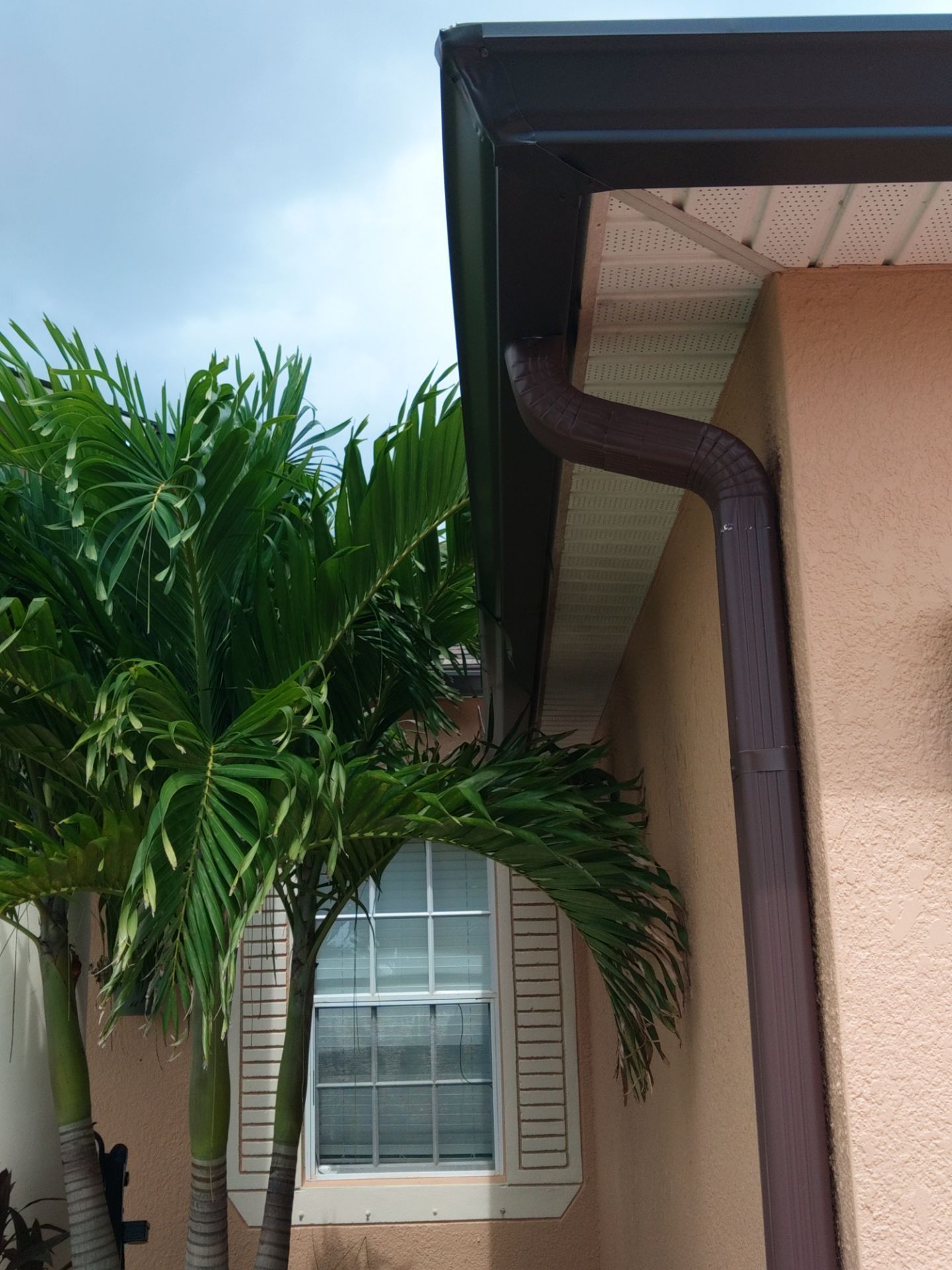 Downspout Installation for Multi-Story Homes in Cape Coral FL by Gutter Professors