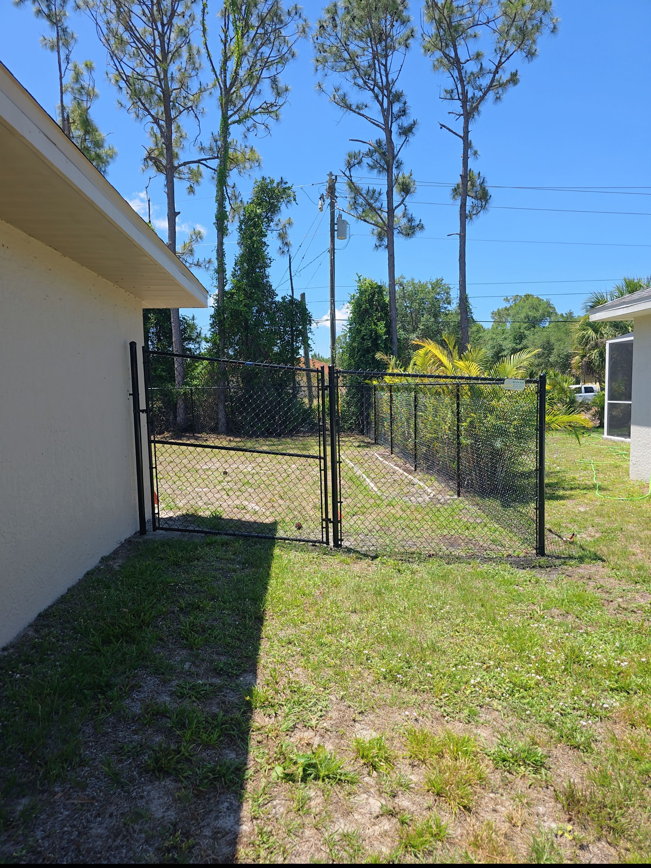 Black Chain Link Fence in North Port by True Fence LLC