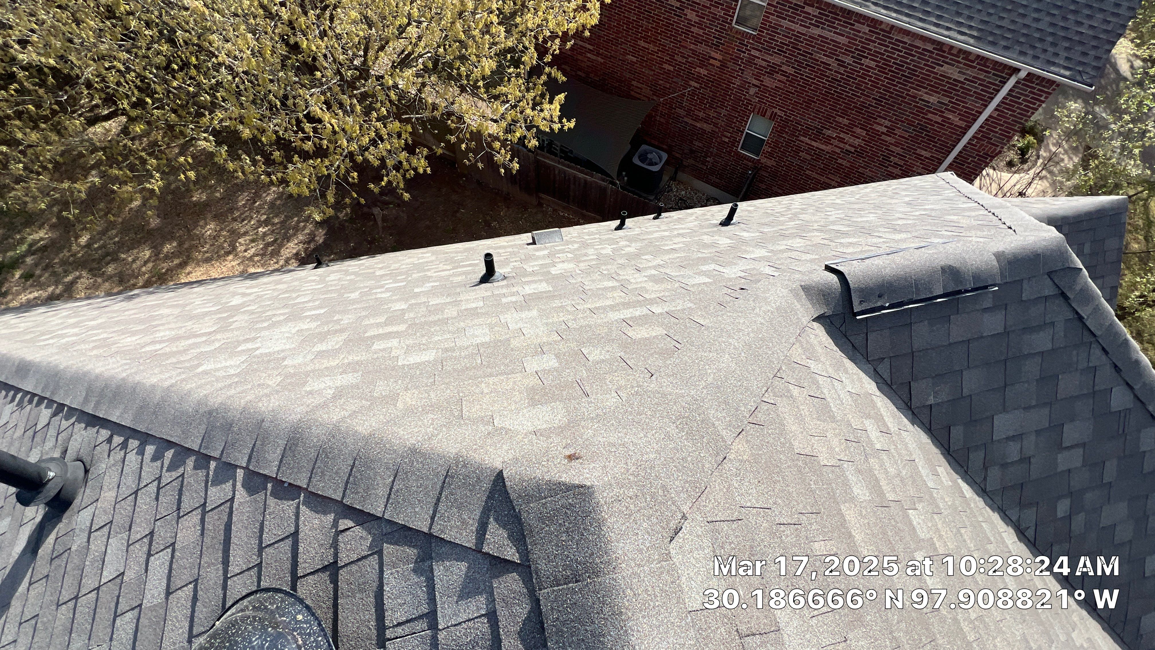 Asphalt Shingle Roof Replacement and Storm Damage Restoration in Austin by Caliber Restoration LLC