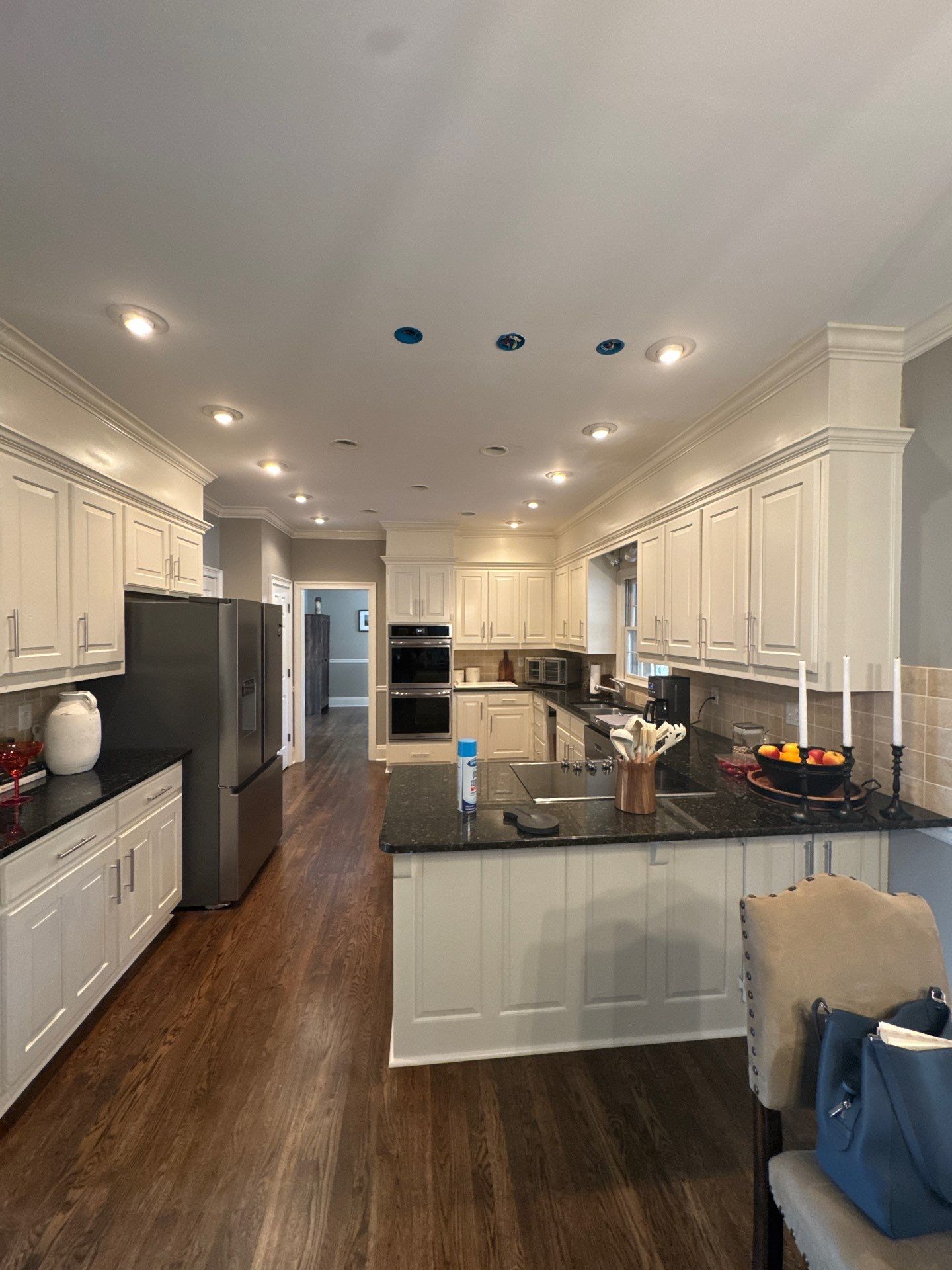 Dark Walnut Hardwood Floor Refinishing and Cabinet Painting in Atlanta by Swift Home Renovations
