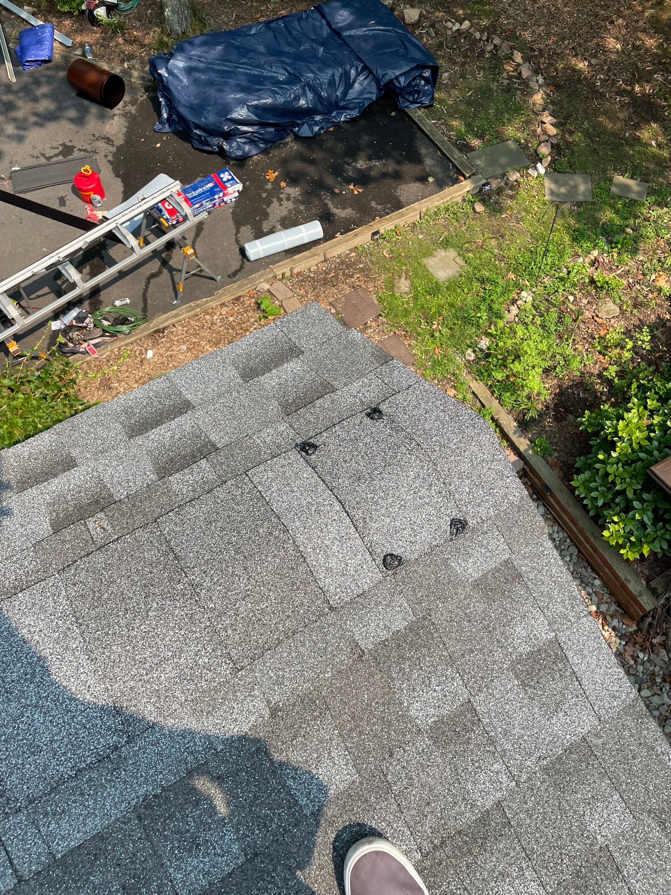 Deckhouse Roof Replacement by American Home Contractors