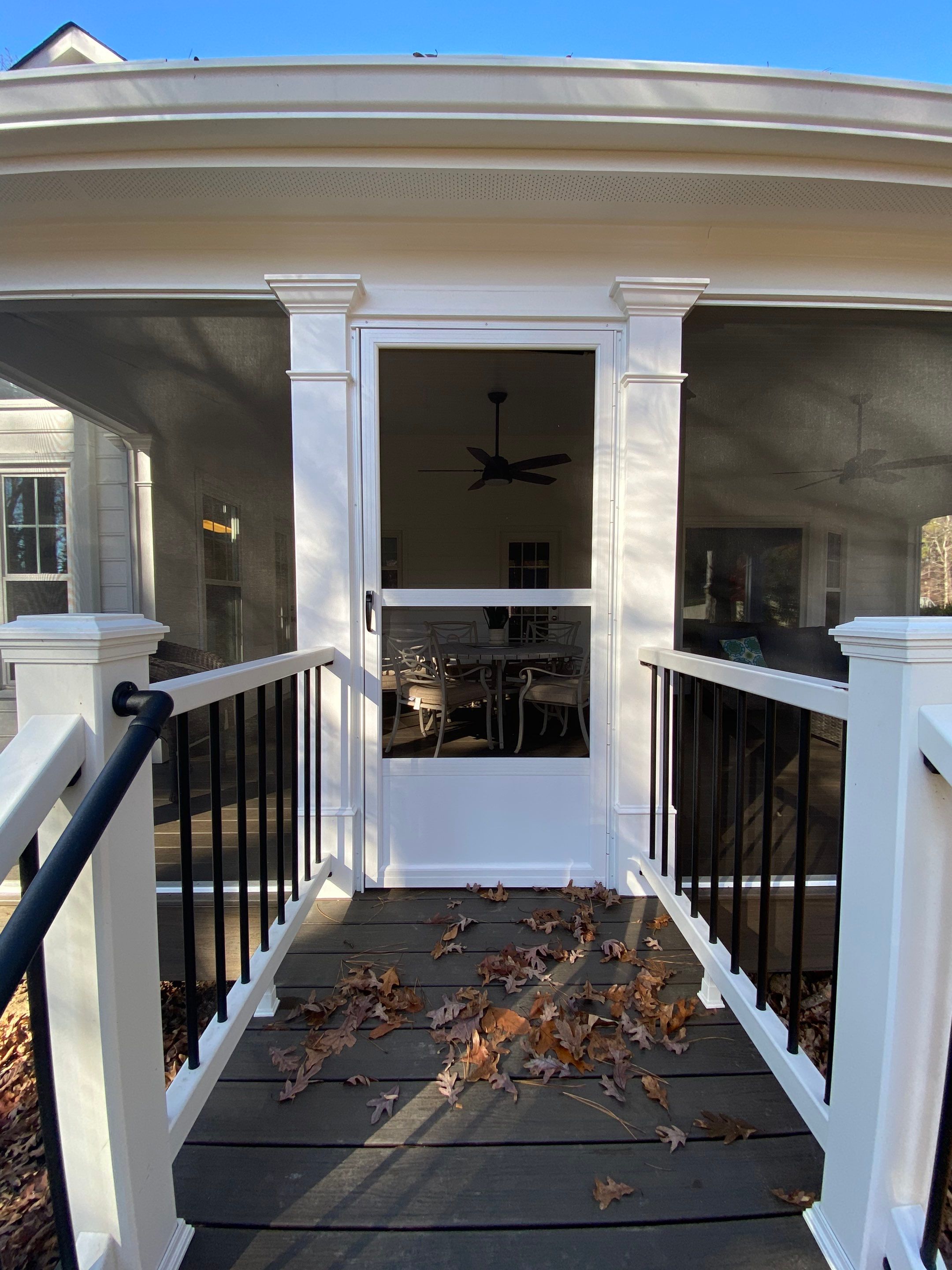 Custom Screened Porch with Beadboard Ceiling and Composite Decking by Swift Home Renovations