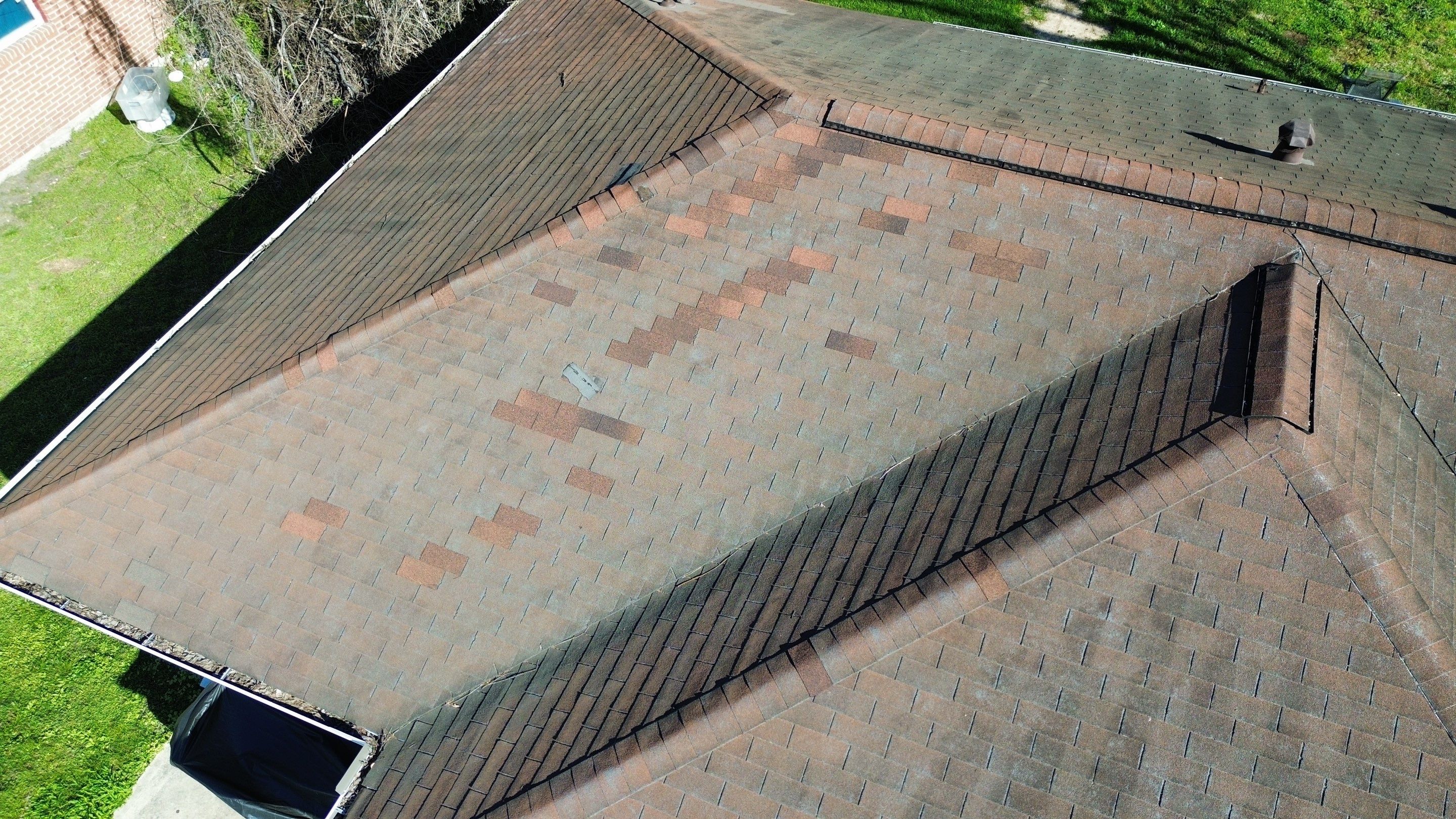 Houston Residential Roof Replacement Using Harbor Blue Architectural Shingles by Houston Roofing & Construction