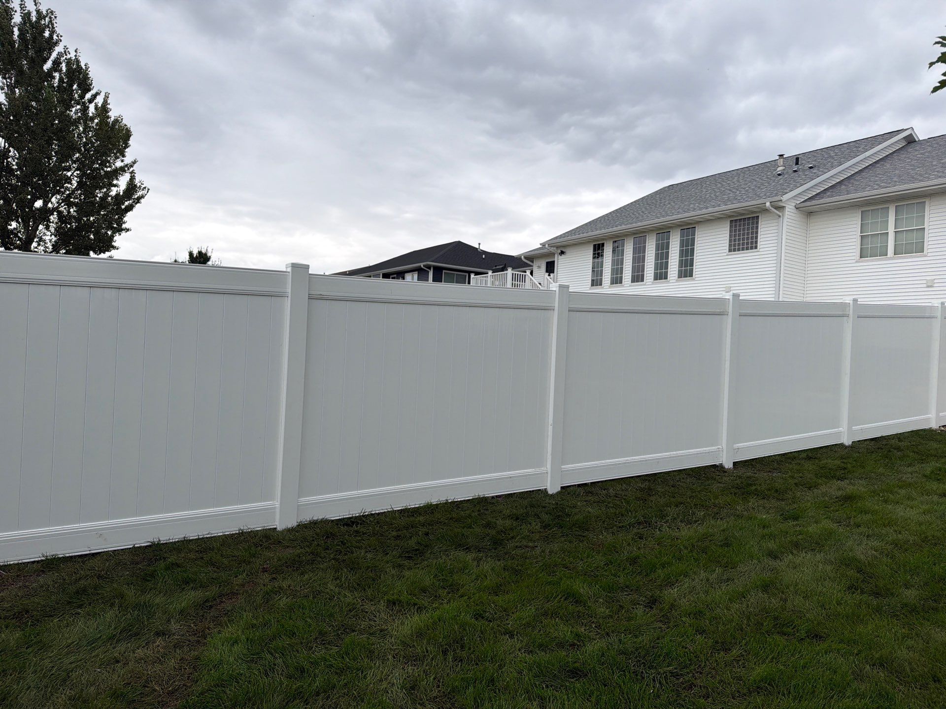 Residential Vinyl Privacy Fence Installation in Urbana by Perfect Picket Fence and Stain