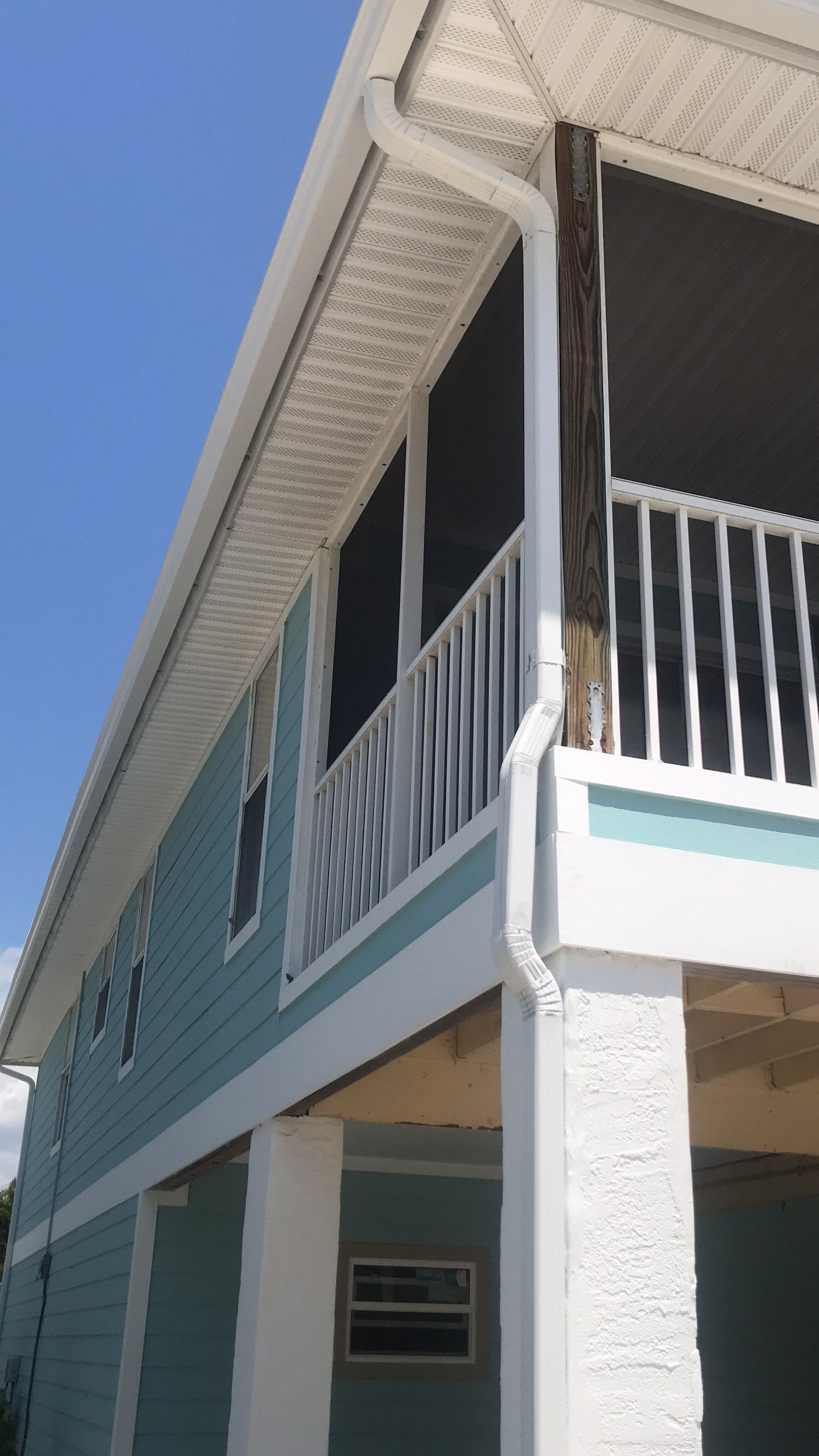 Downspout Installation for Two-Story Homes in Fort Myers FL by Gutter Professors