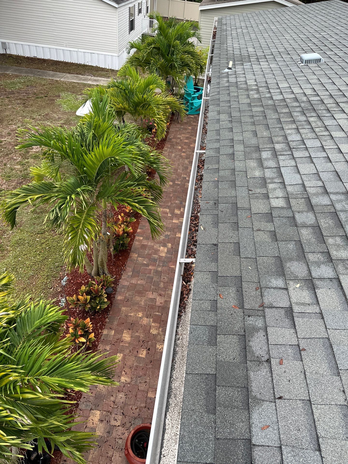 Gutter Cleaning and House Washing Services  by Sunshine AquaWash
