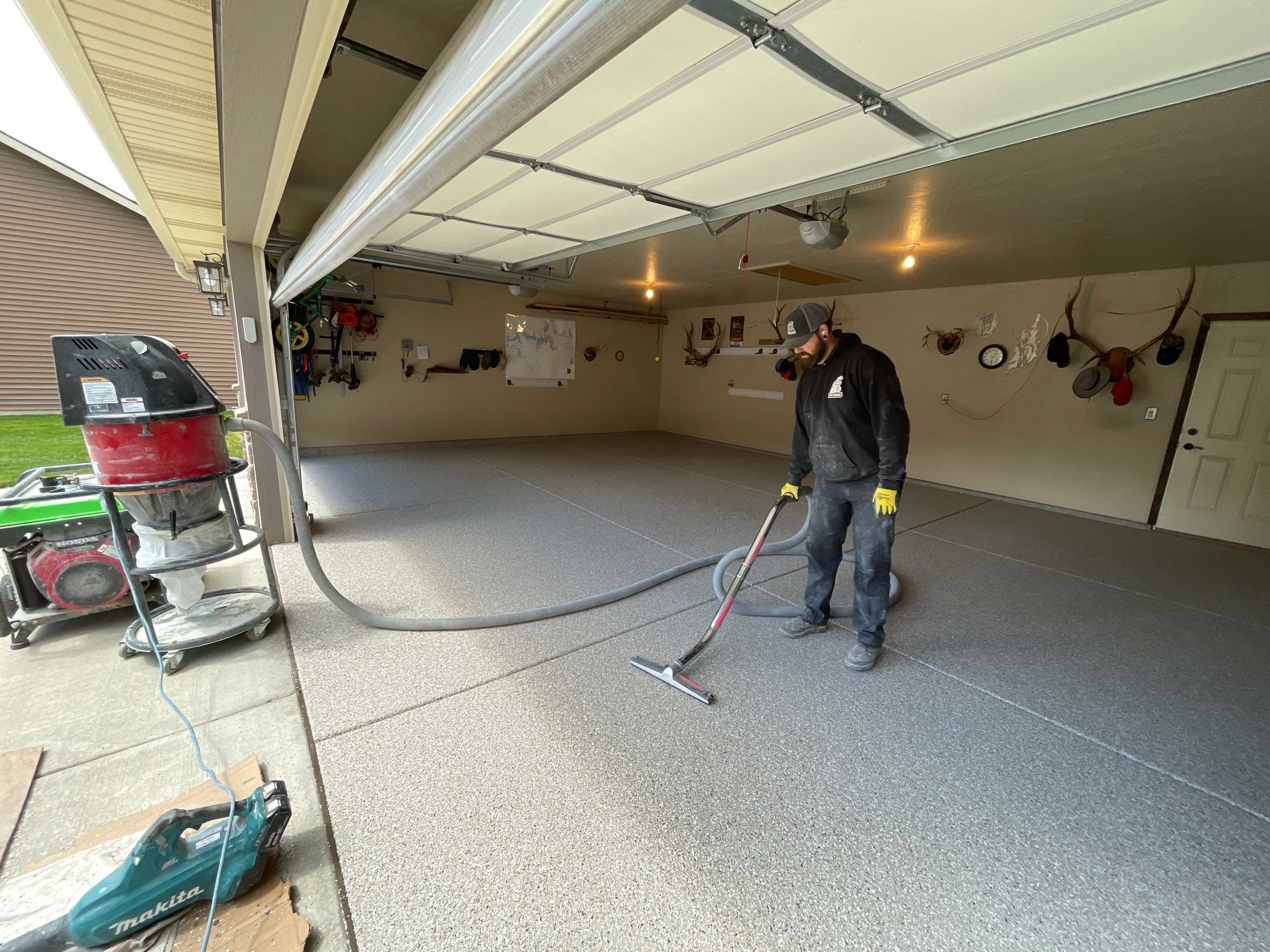 Garage Transformation using Pebble Beach and Front Porch using Greystone by Croc Coatings, LLC