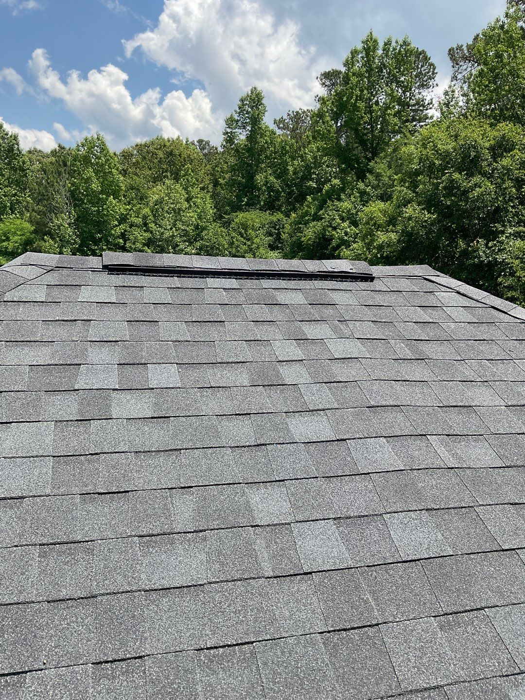 Residential Roofing Installation using Tamko Heritage lifetime shingle in Rustic Black by Sands Roofing & Construction
