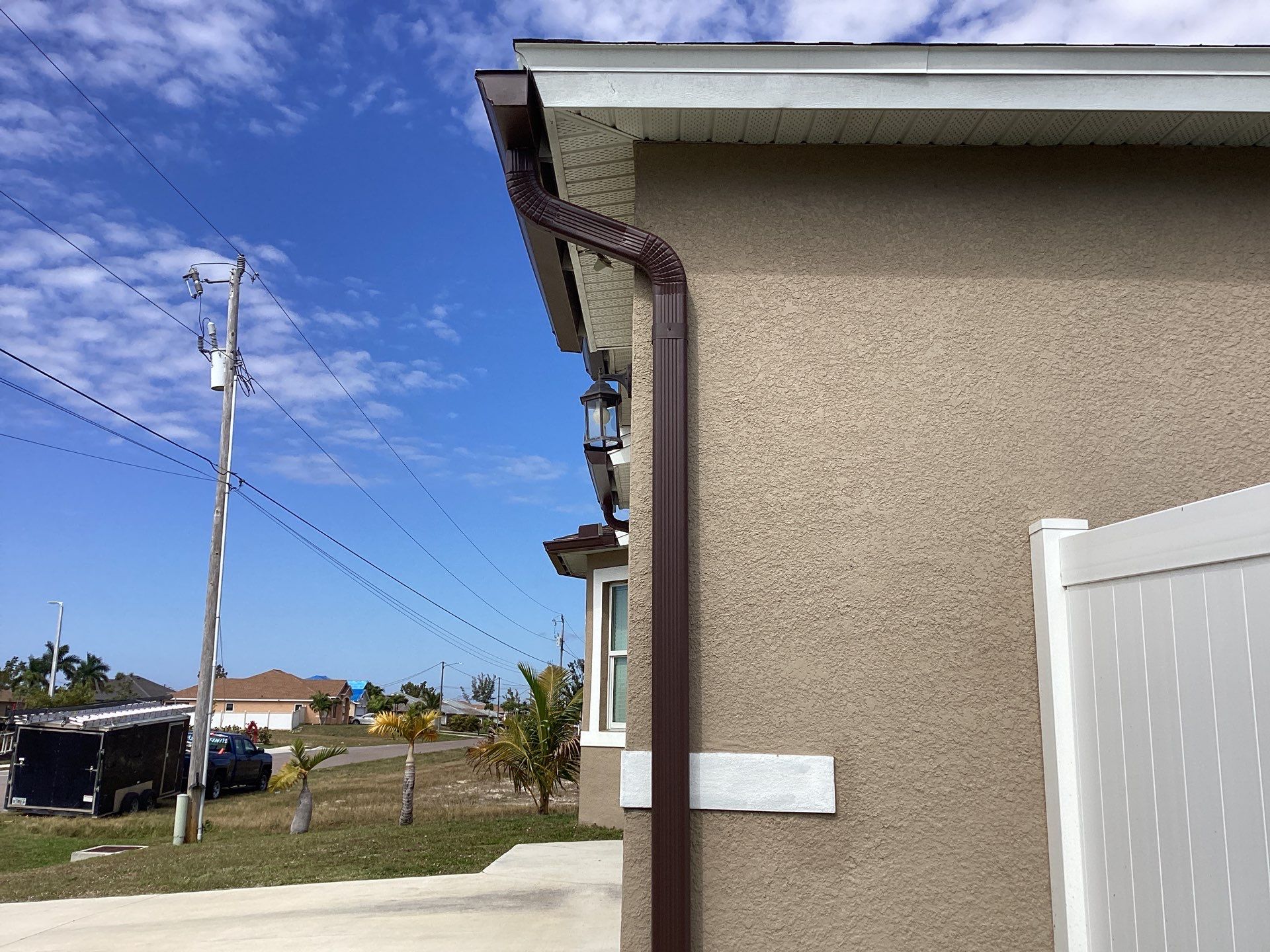 Royal Brown Seamless Gutters in Cape Coral FL by Gutter Professors