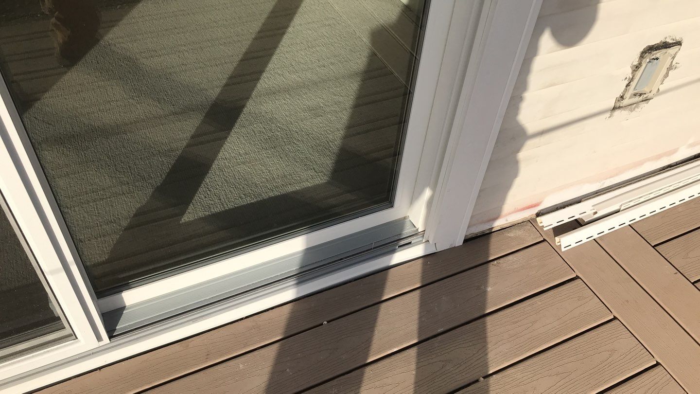 Deck Refurbush and Door Replacement using Trex Decking and Railing. Polaris Patio Doors by Secure Construction Company Inc