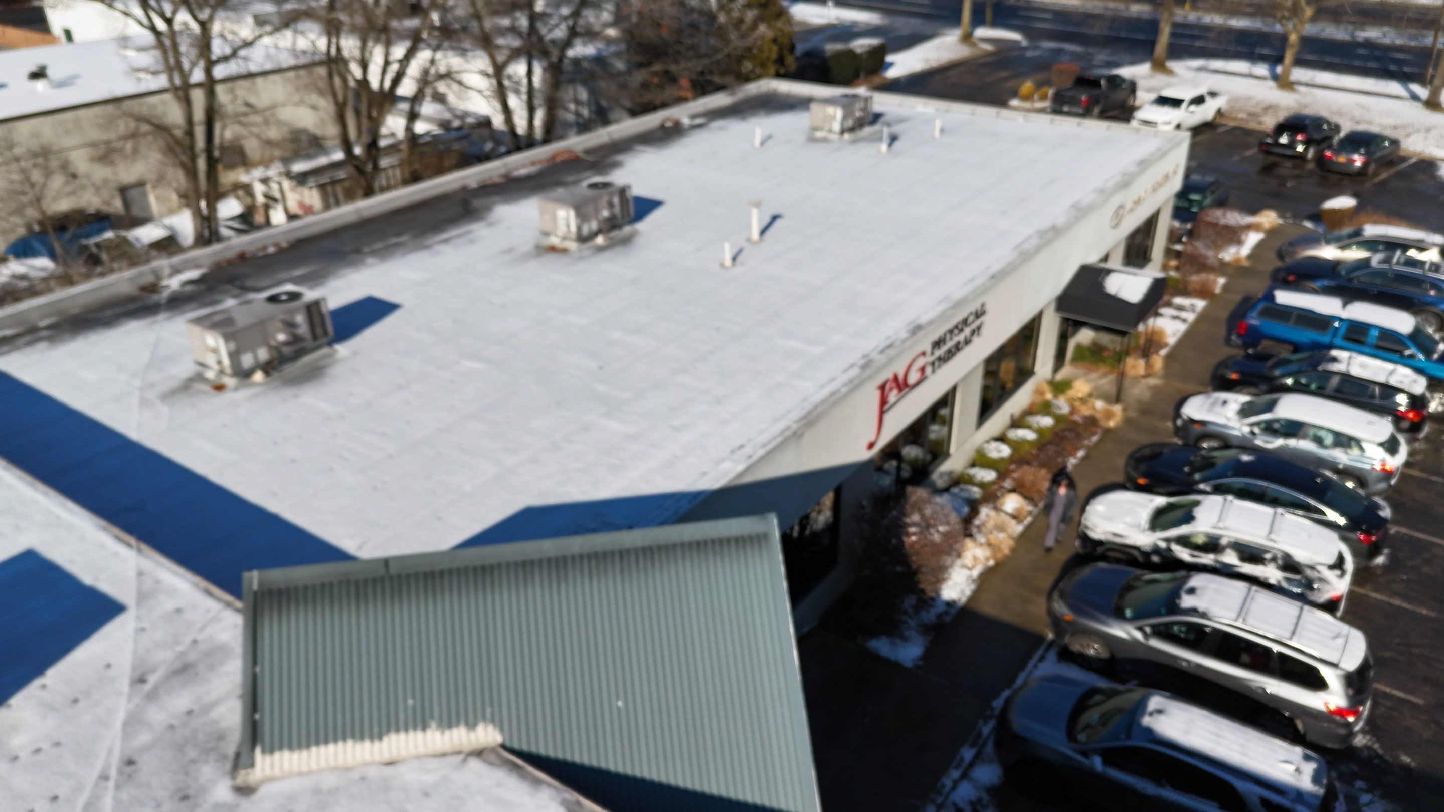 Bohemia Flat Roof Cleanup  by Above All Gutters 