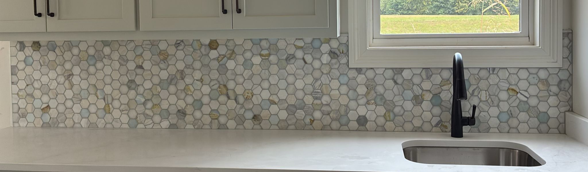 New backsplash by Knockout Flooring LLC