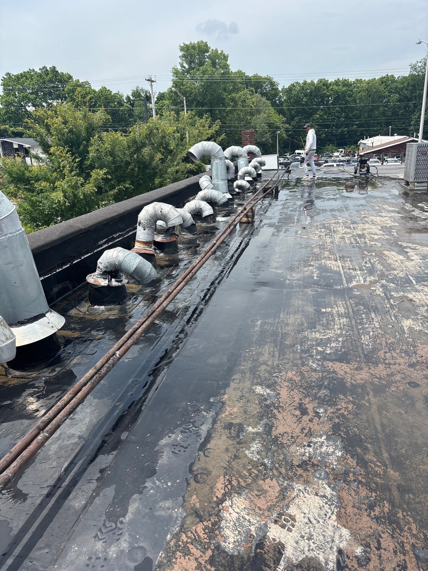 Commercial Roofing Repair using 60 mil rubber roof  by Nitro Roofing and Construction