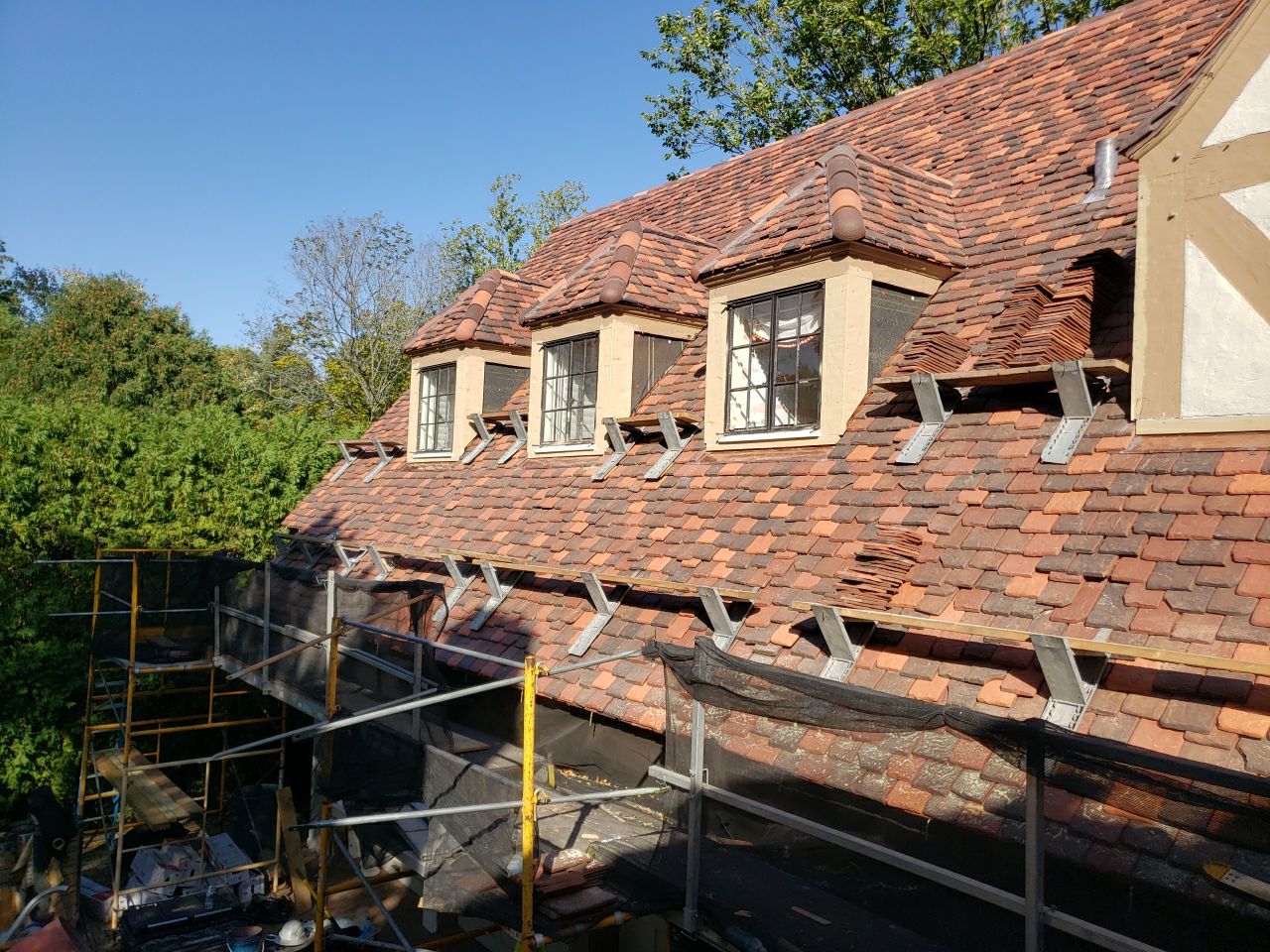 Ludowici Roof Installment and Half Round Copper Gutter Replacement  by Custom Installations