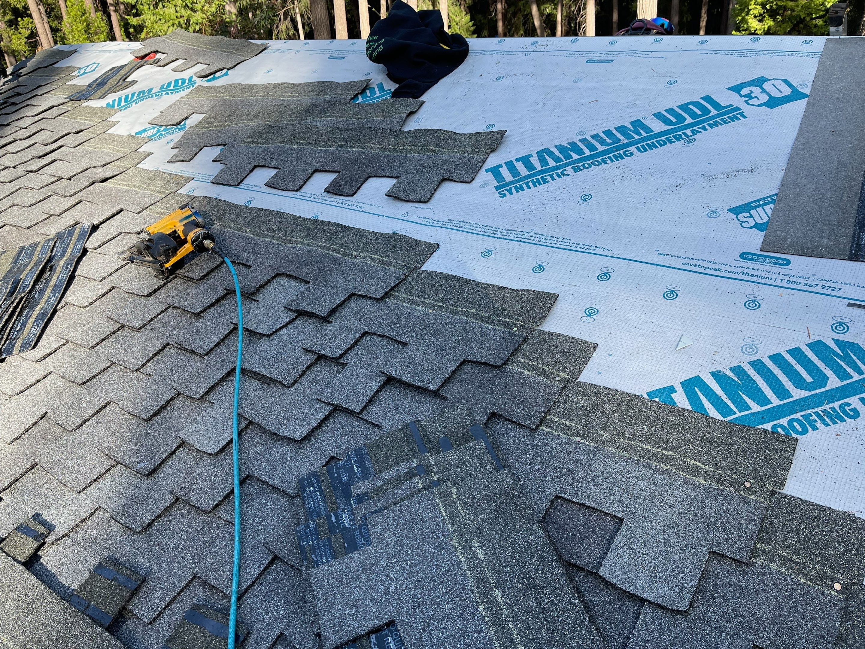 Residential Roofing Installation using Owens Corning Insulation by Byers Enterprises 