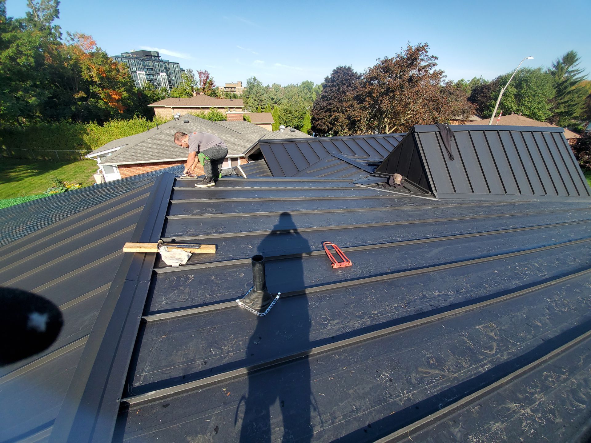 Residential Roofing Installation using 16" Standing Seam Panels by Jay Carter Roofing & Sheet Metal