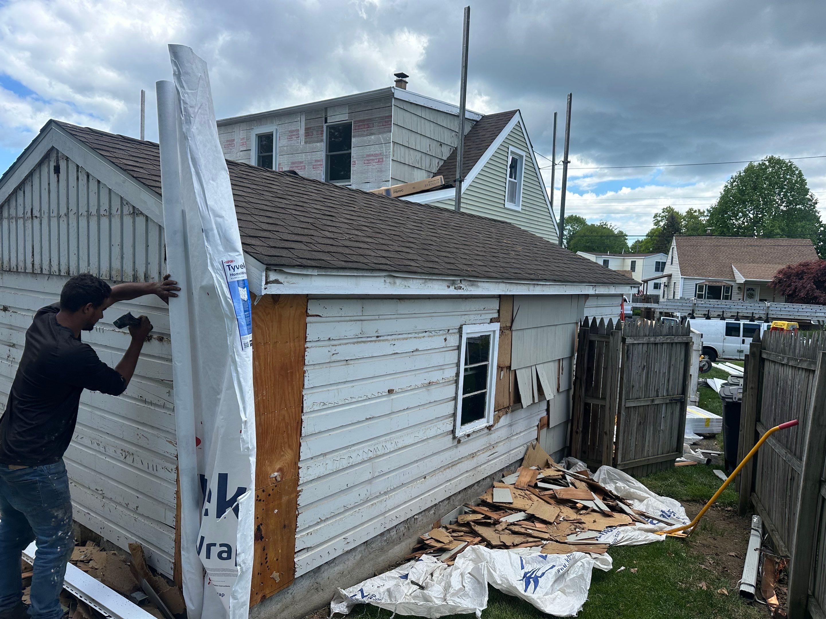New Vinyl Siding Installation for Milford Home and Detached Garage by A Plus Exterior