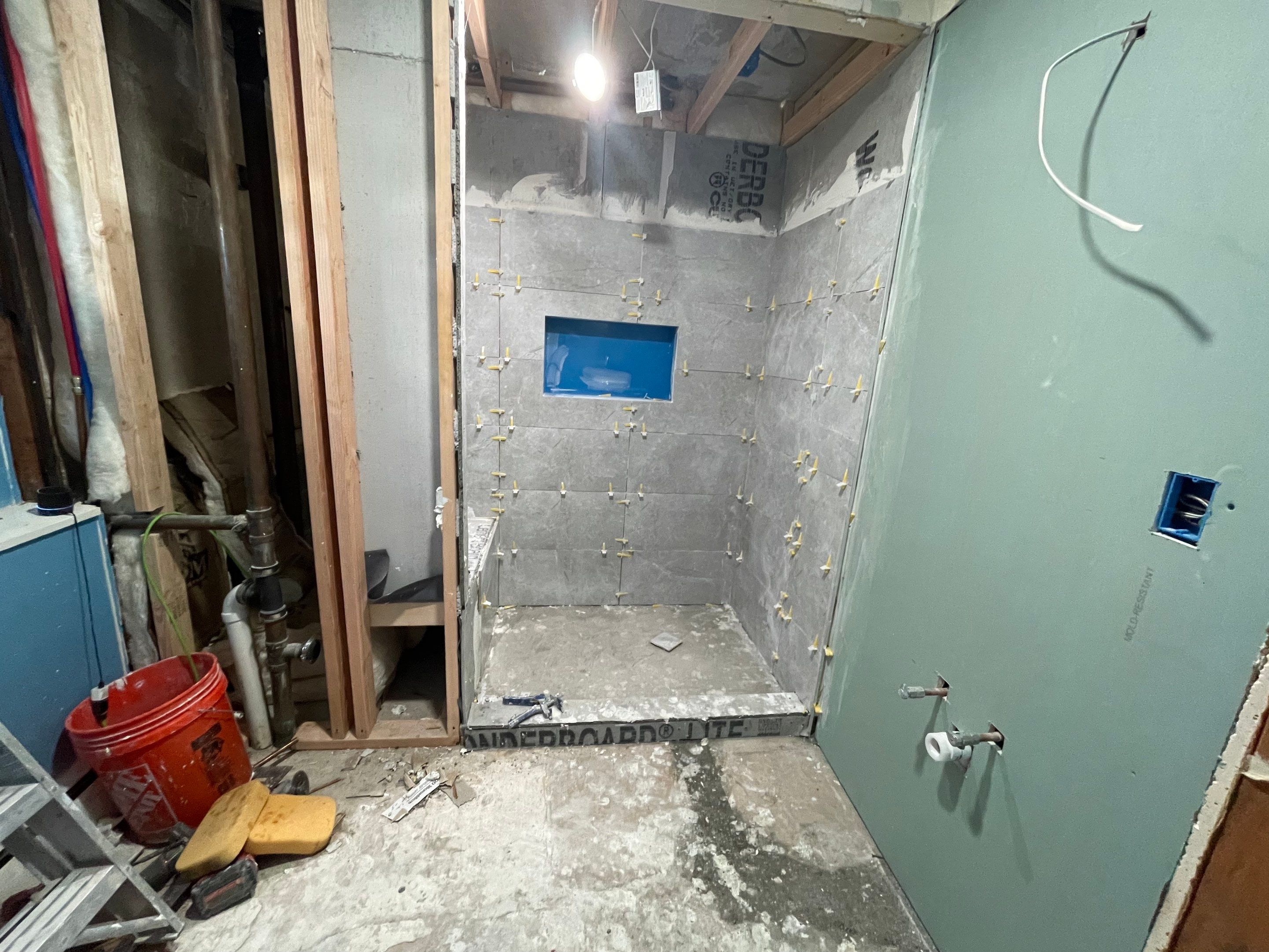 Bathroom Remodel using Tile by Home Concepts Construction