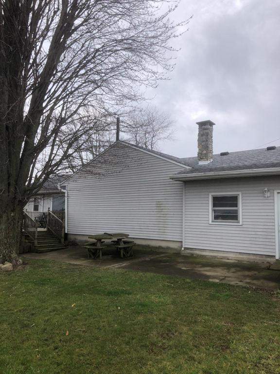 Storm damage roof replacement by Nitro Roofing and Construction