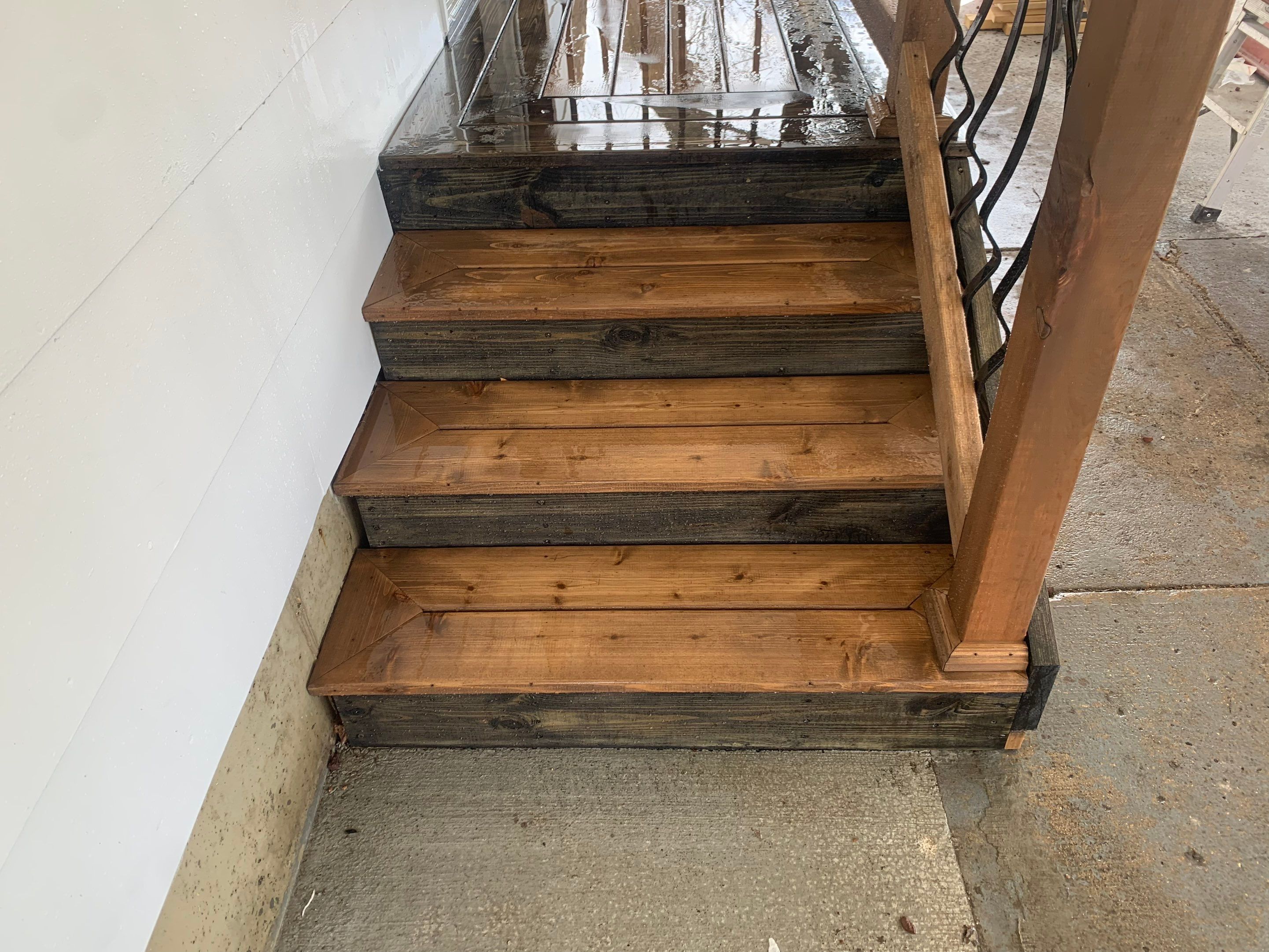 Deck re stained  by Cutting edge painting 