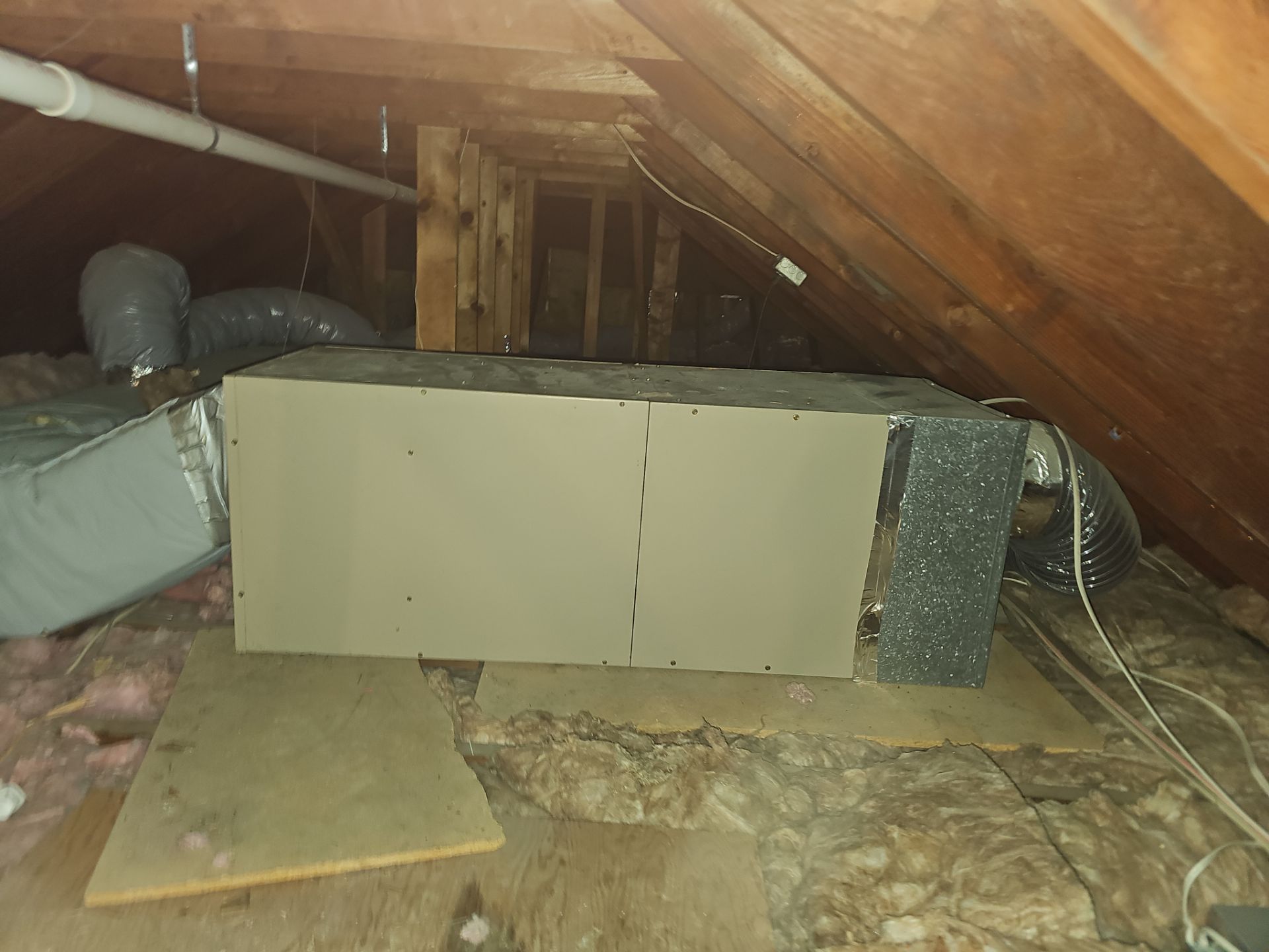 Bryant Central Heat Pump and Attic Air Handler Installation in Portsmouth by Ocean State Air Solutions