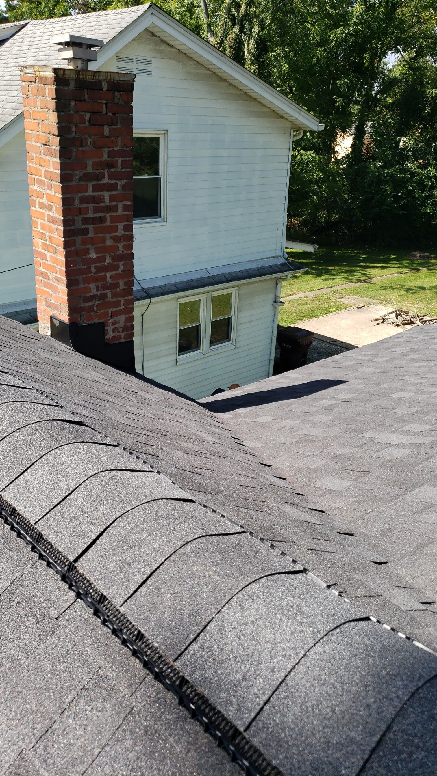 ATLAS PINNACLE COLOR: PRISTINE SCHOTCHGARD BLACK SHADOW DRIP EDGE: BLACK by Eagle Eye Roofing