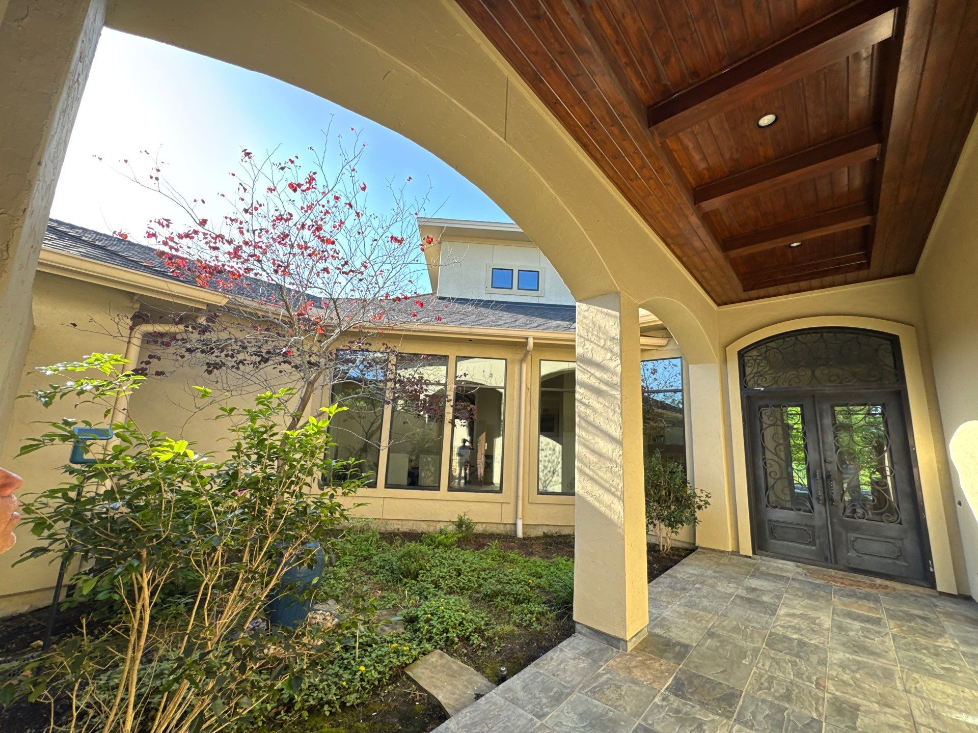 Complete Exterior Painting and Stucco Refinishing in Spring by Rolling Nations