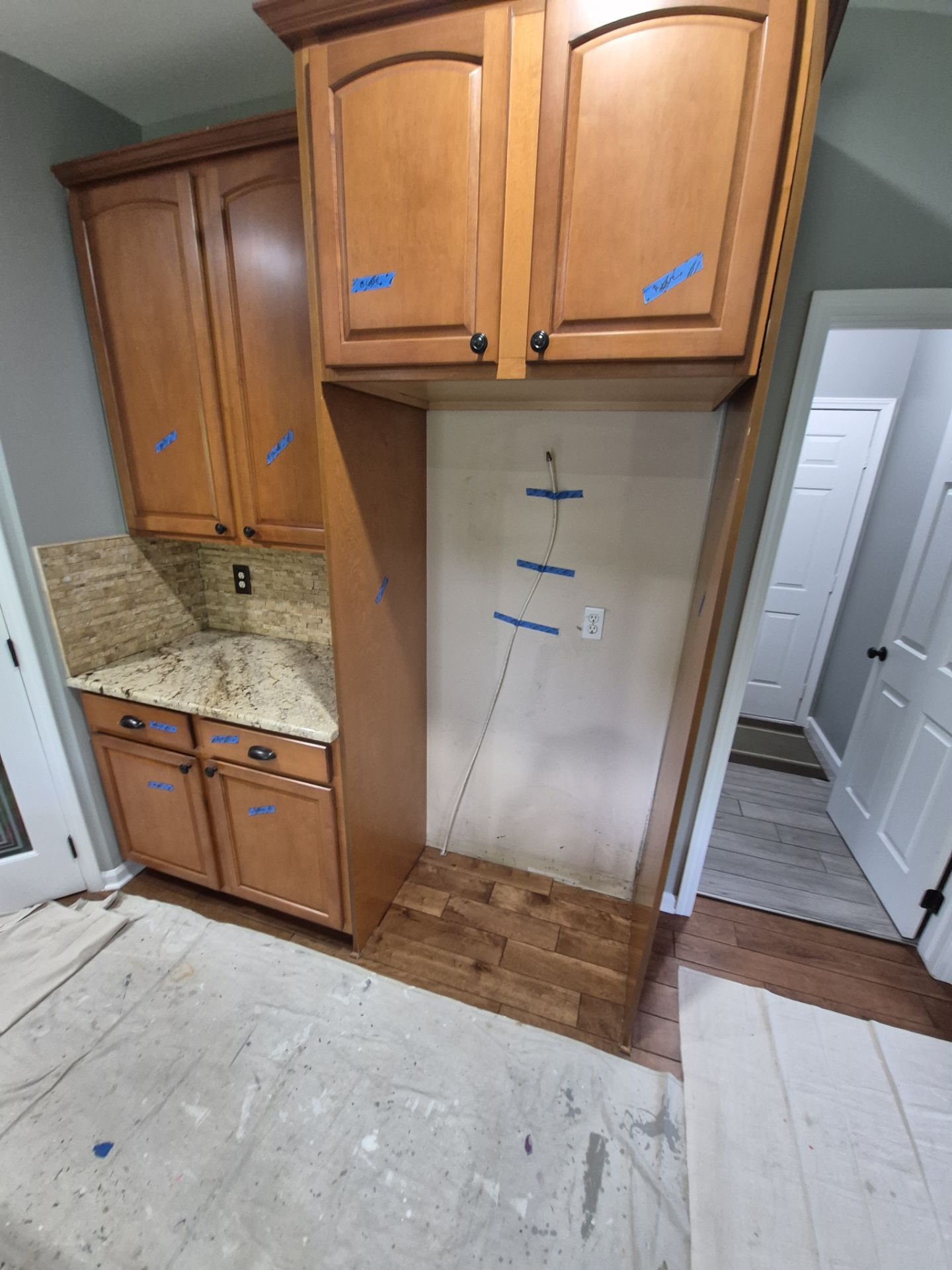 Kitchen Cabinet Refinishing by Top Shelf Painter