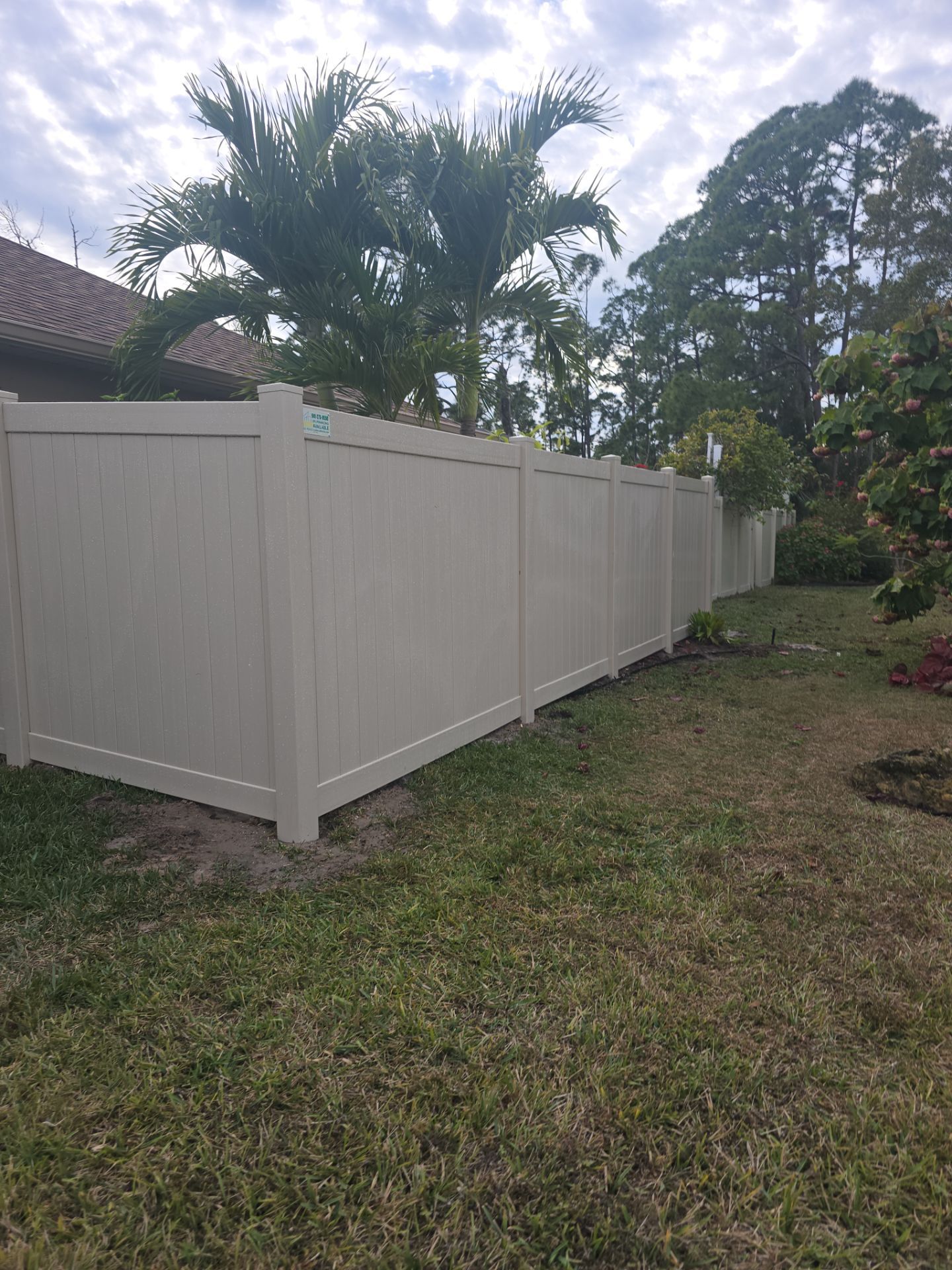 Tan Vinyl Fence in North Port by True Fence LLC