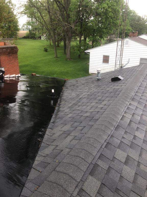 Residential Roofing Installation using 60 mil rubber roof  by Nitro Roofing and Construction