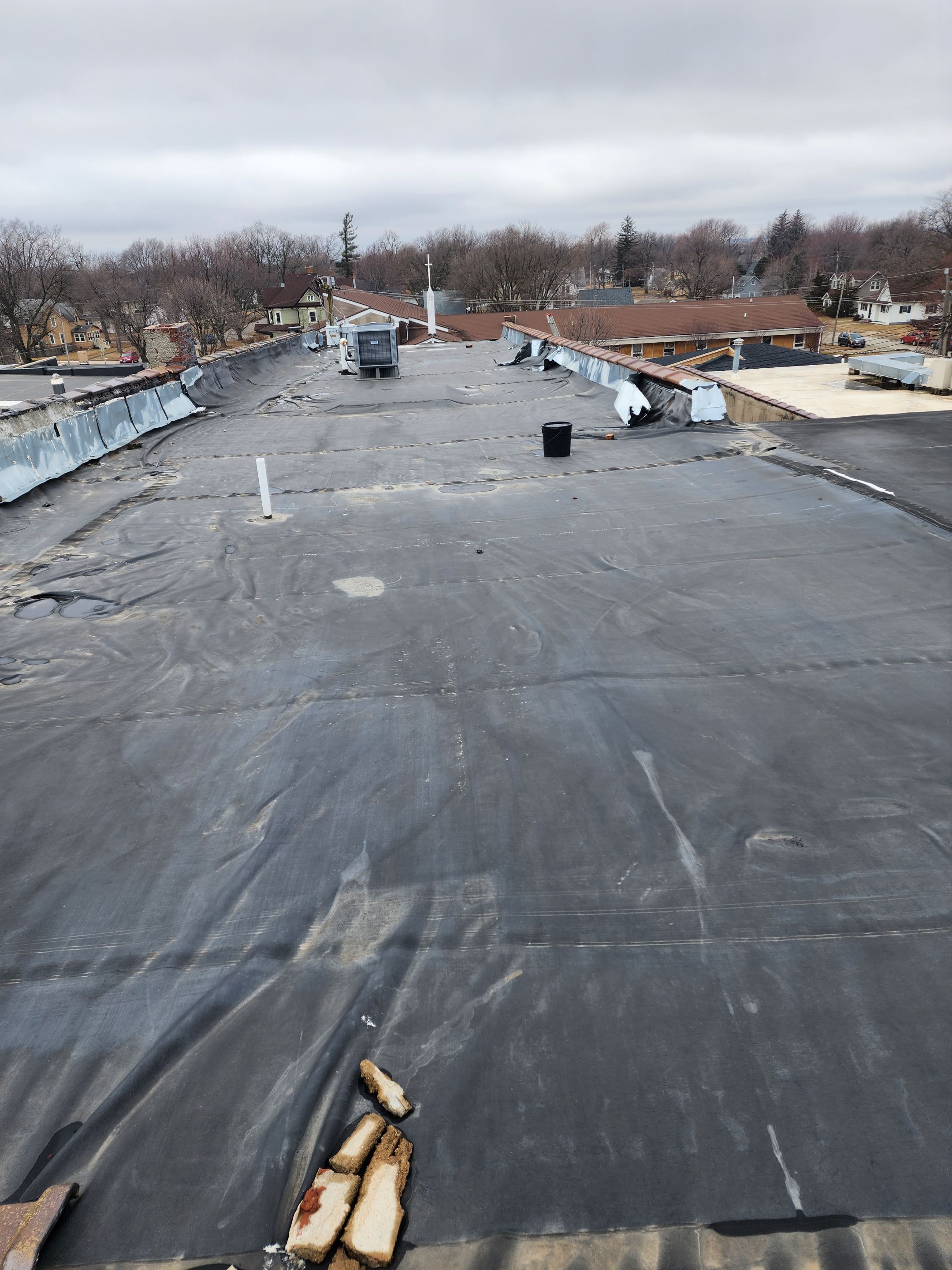 Roof Recover on a downtown building in Lake City  by Grell Roofing, LLC