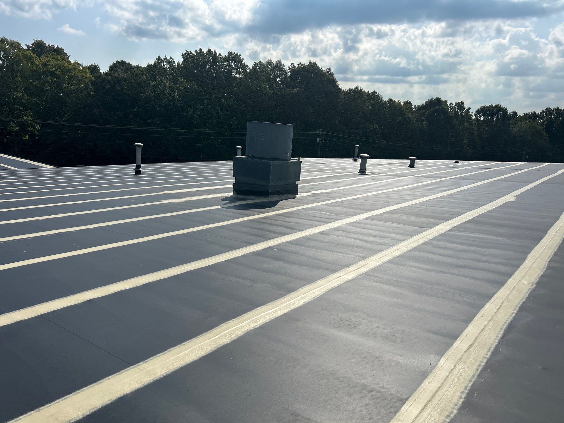 Commercial Roofing Installation using Coatings by Kentucky Commercial Roofing