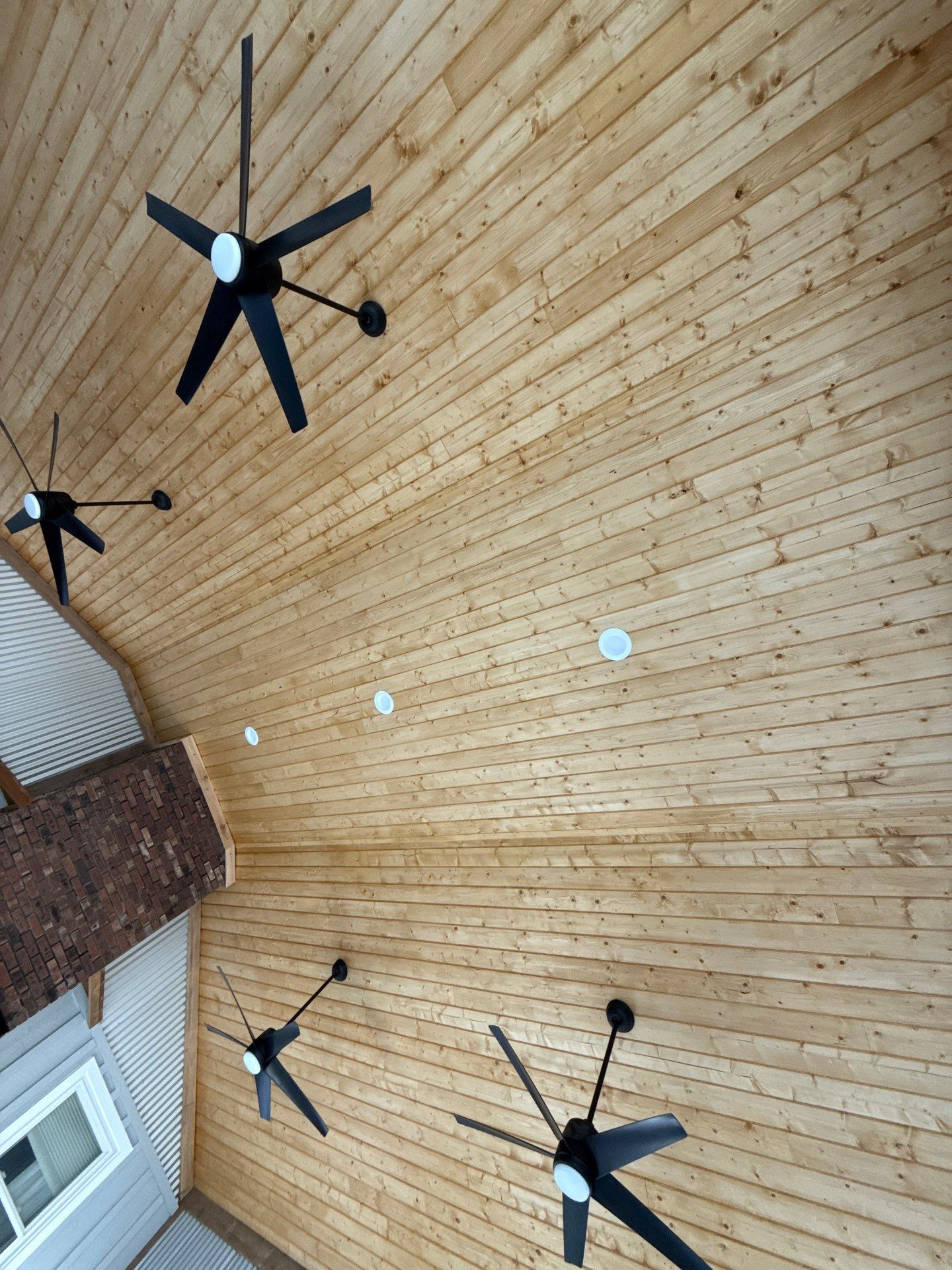 Sunroom and Garage Addition by Skilled Construction LLC