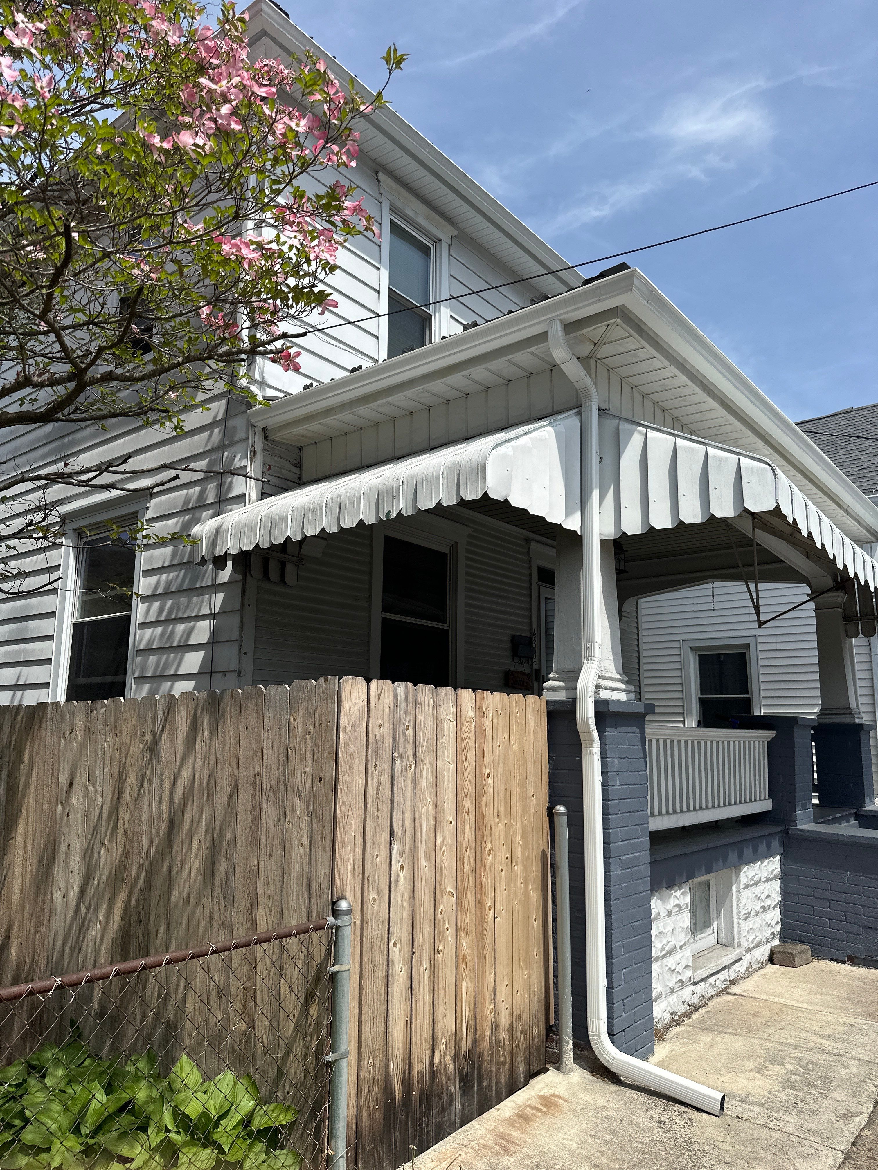 Charcoal Metal Roof & Blue Siding — A Refreshing New Look by Esh Builders