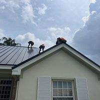 24ga 1.5" Mechanical Seam Dark Bronze by Total Roofing System The Metal Roof Experts