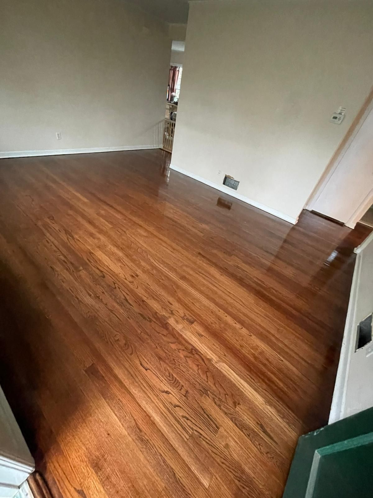 Red Oak Refinish using Duraseal Md Brown with Semi Gloss Finish by Footprints Floors Morristown