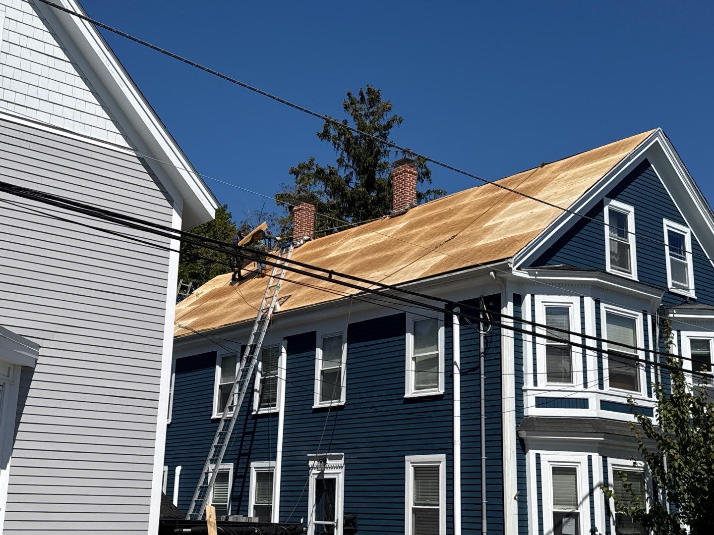 Half Roof Replacement for Solar Installation – Townhouse with New Plywood Decking by Sensible Home Solutions