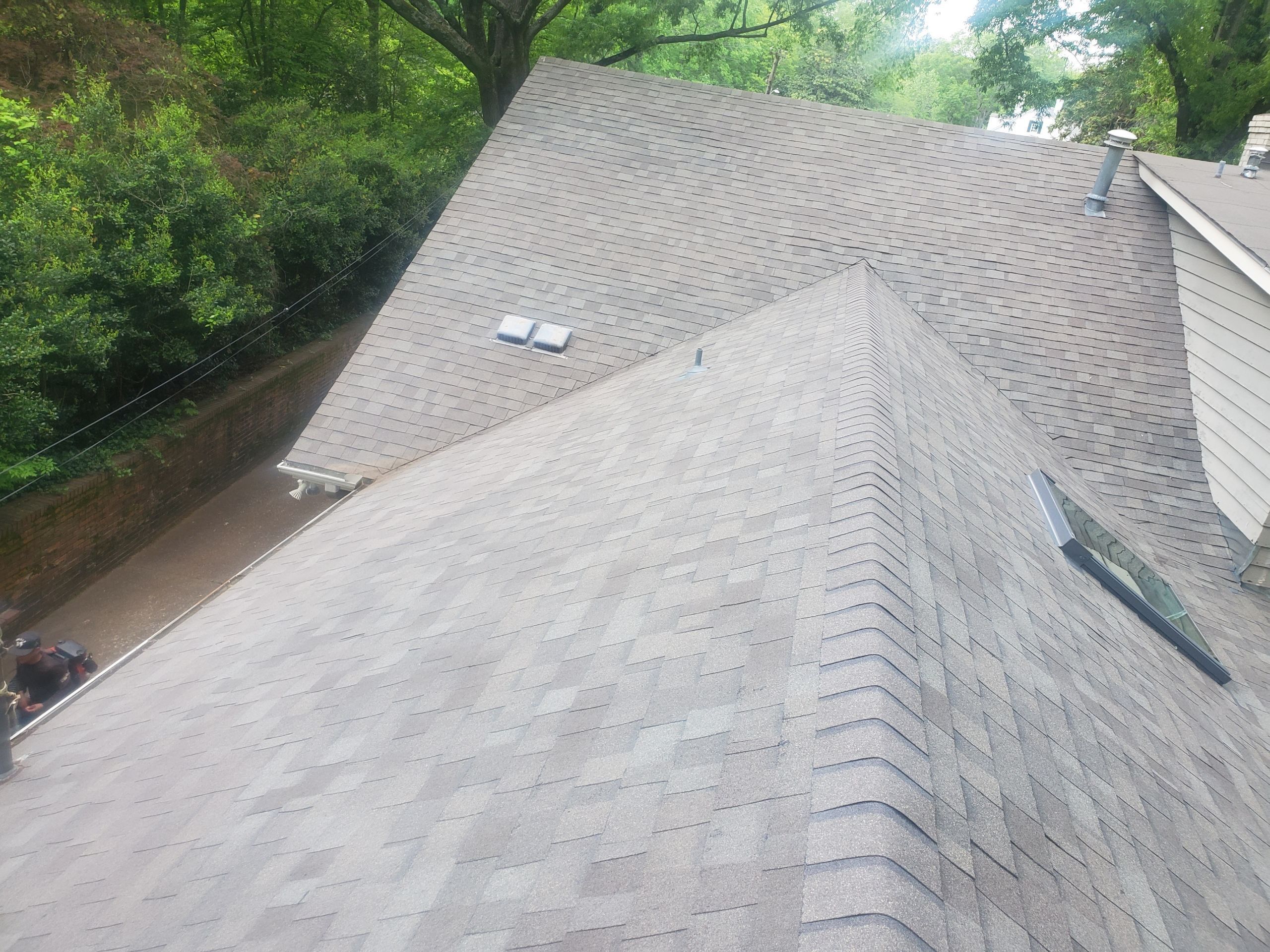 Architectural Shingle Roof Replacement with New Skylights in Memphis by Revival Roofing Services