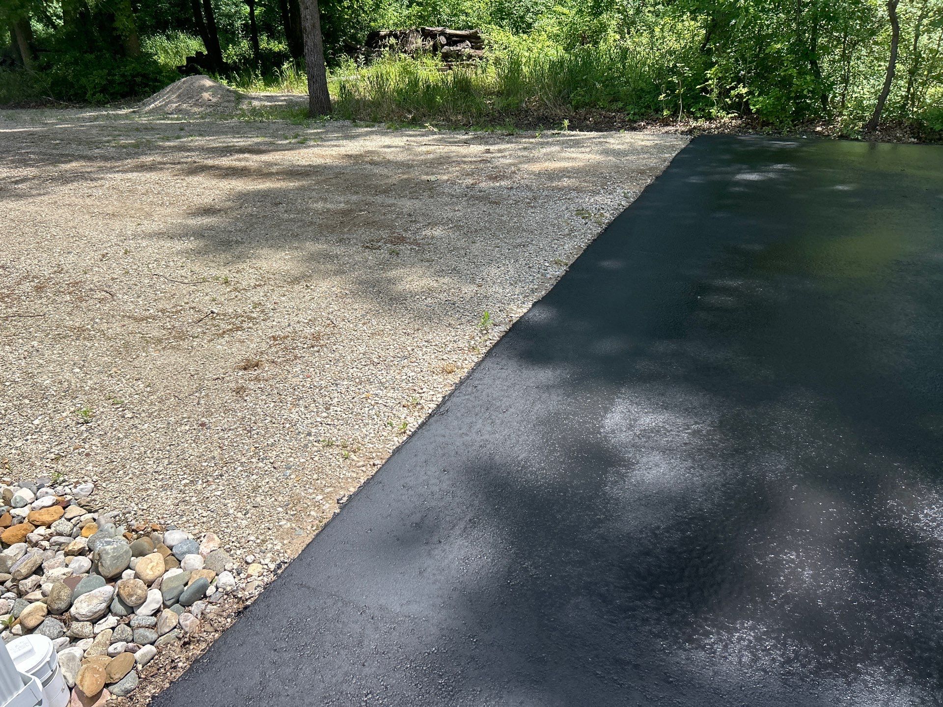 High end residential driveway by Quality Asphalt & Maintenance LLC