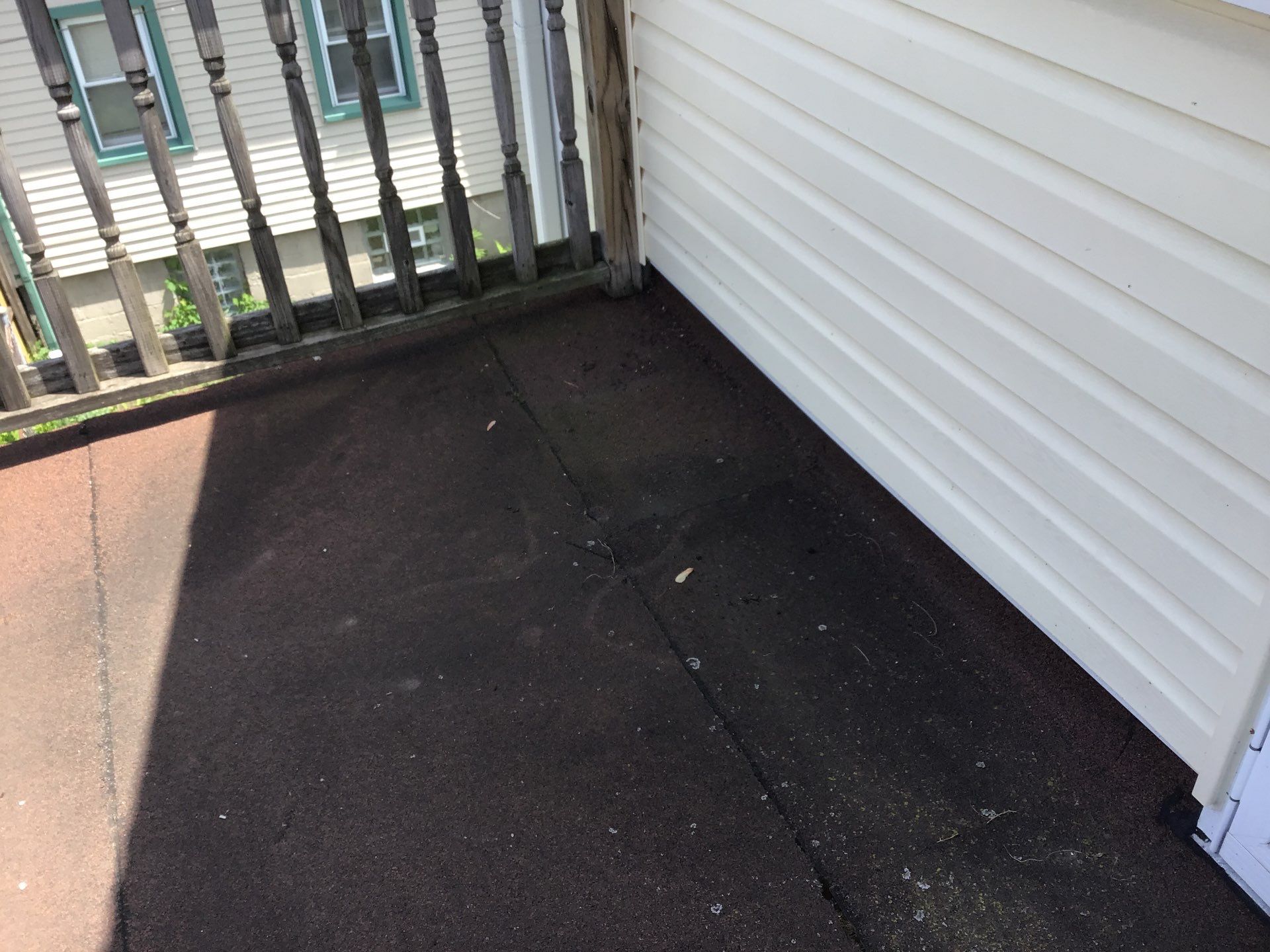 Rebuild balcony flat roofing TREX decking stairway and Railings in Wyandotte, MI by Northwest Construction 