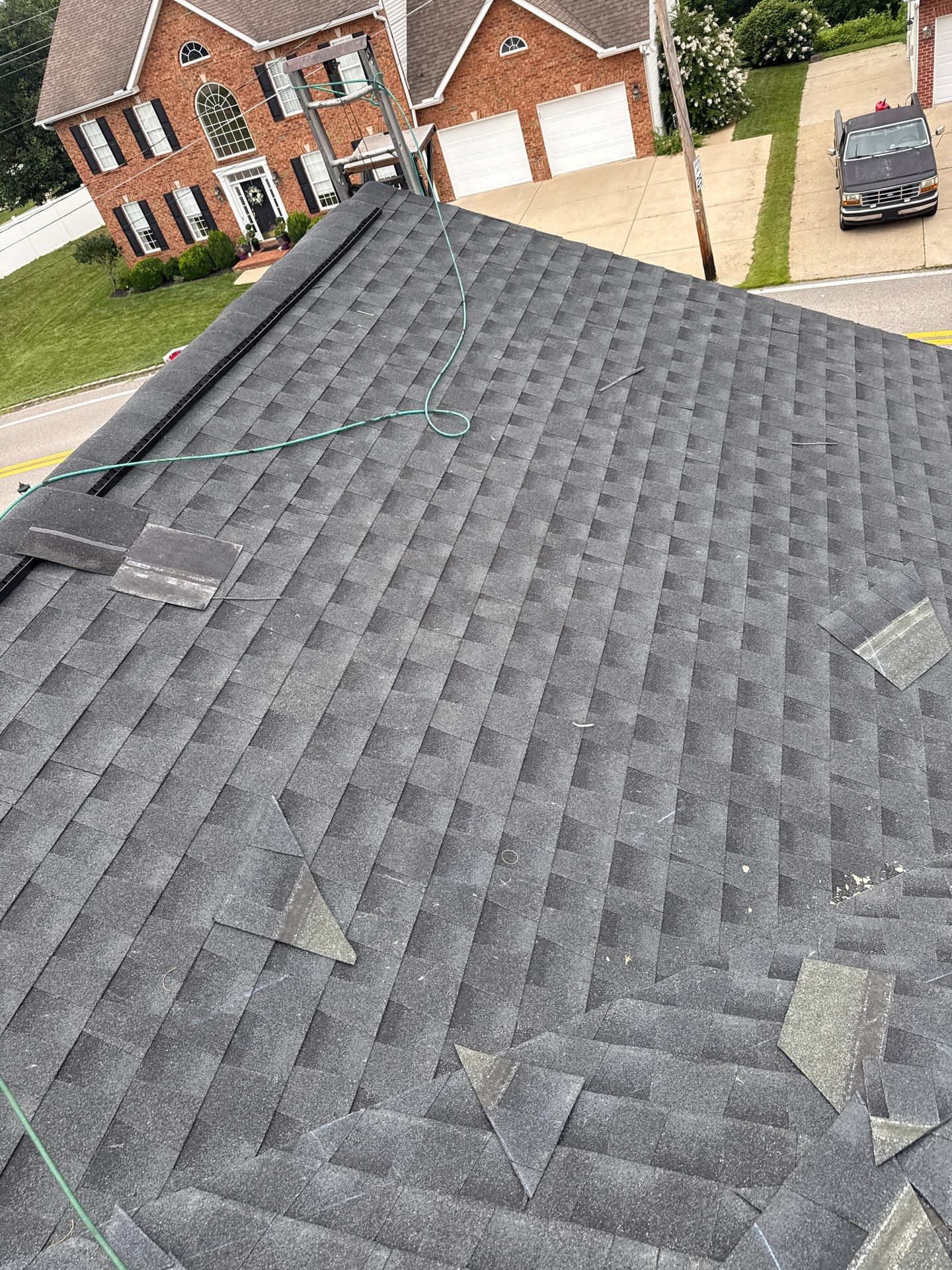 Residential Roofing Installation using GAF Timberline HDZ Charcoal by Rainstoppers Roofing