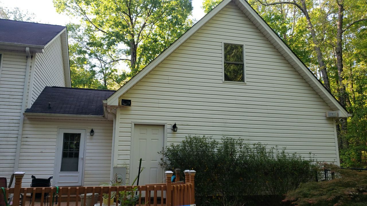 House Wash using cleaner by Power Wash Masters LLC