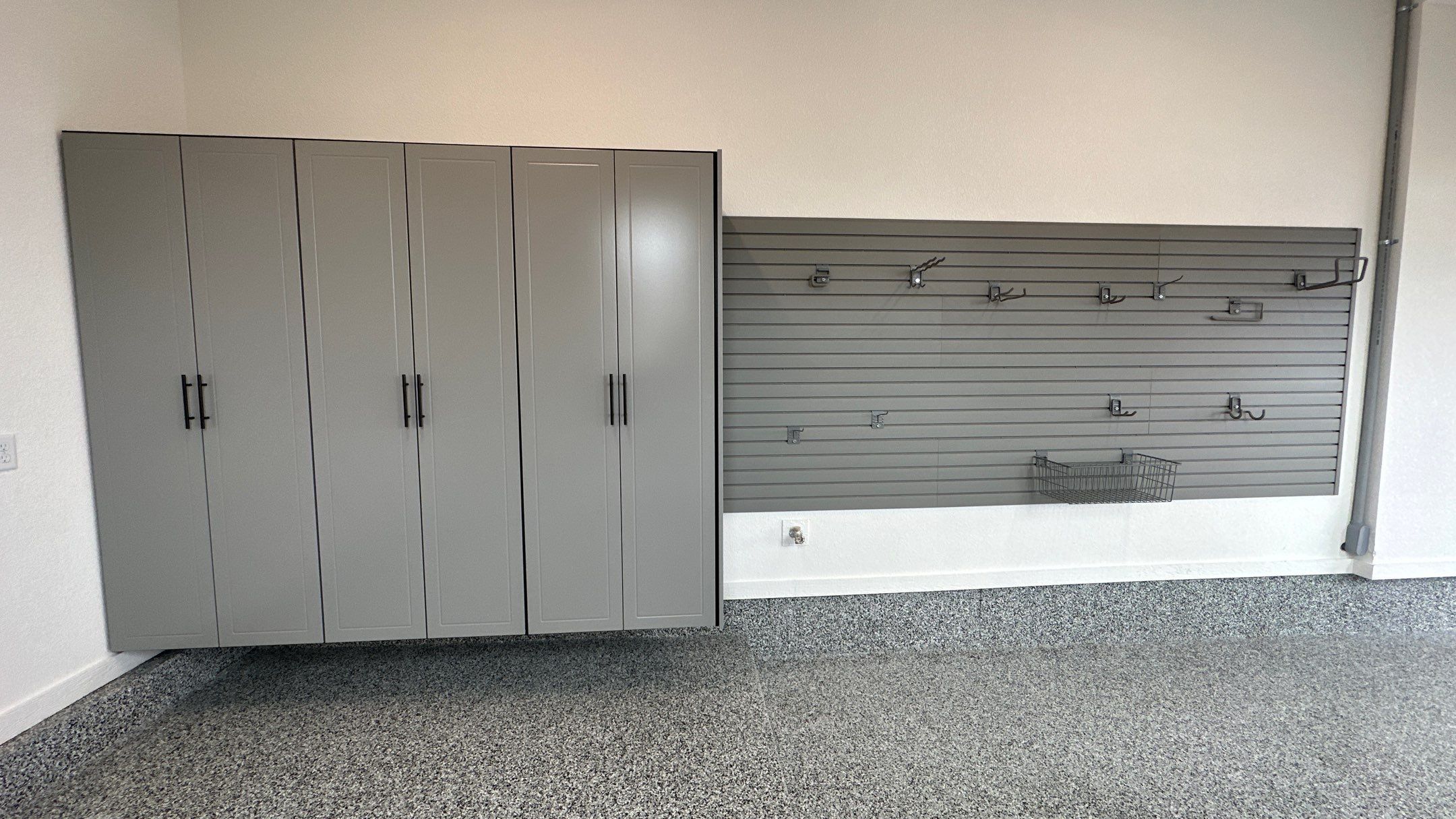 Mike & Pam transformed their garage with a Banner Garage Floor and Cabinets by Banner Garage