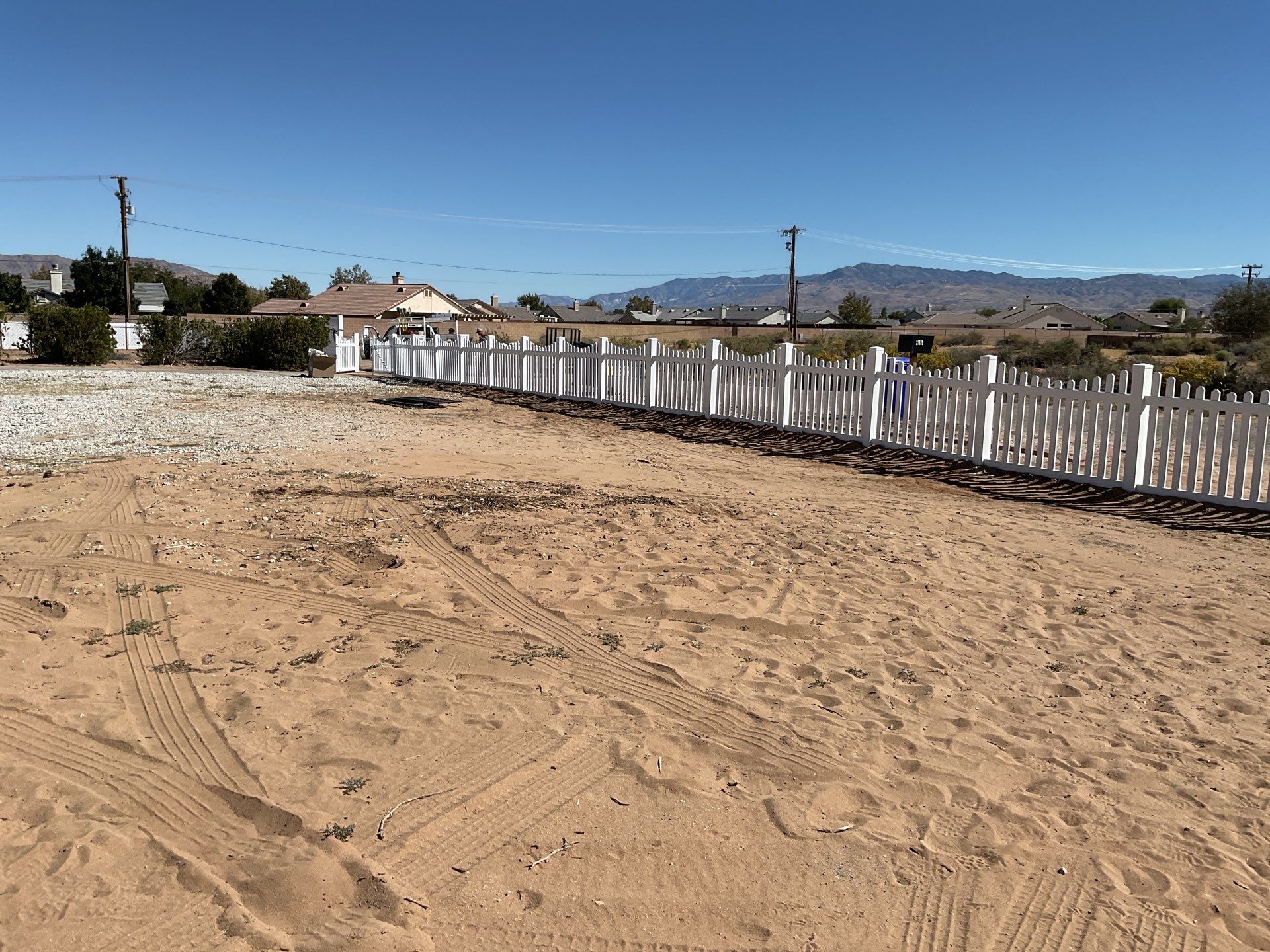 White picket fence  by Fence Guys Inc. 