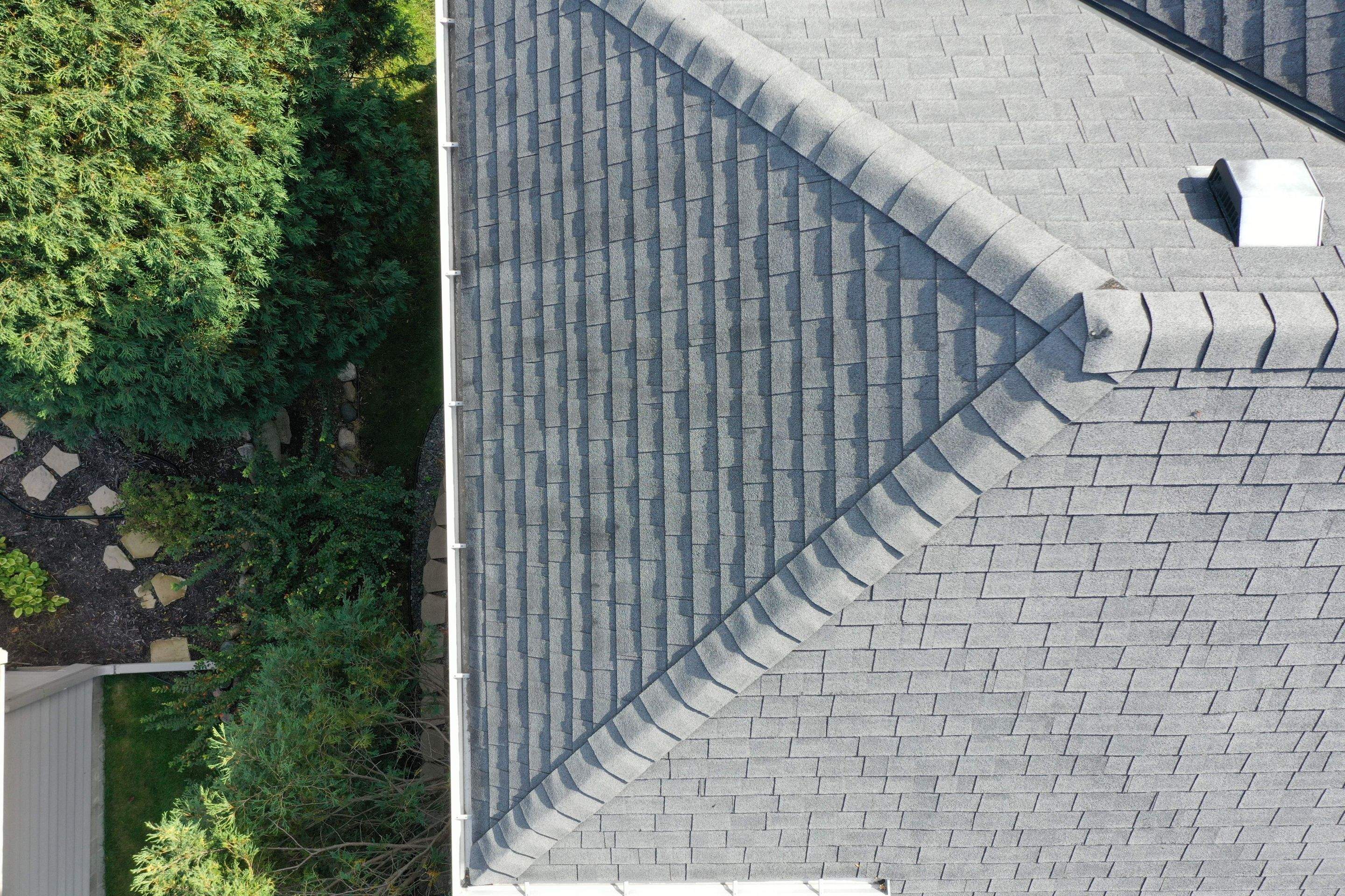 Residential Roofing Installation using Certainteed Landmark Moire Black by MODERN EXTERIOR SYSTEMS