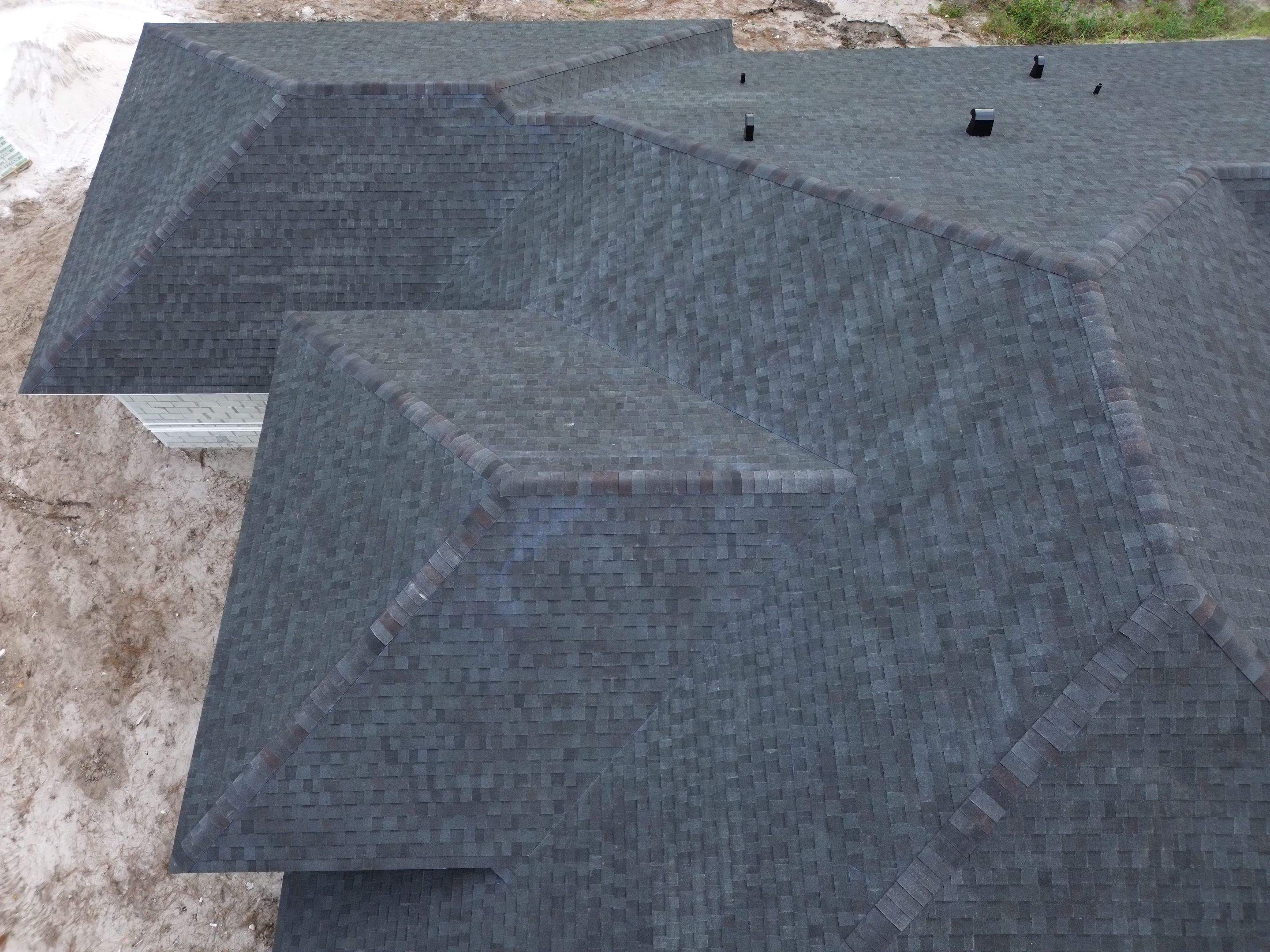 Tamko Heritage Black Walnut  by Total Roofing System The Metal Roof Experts